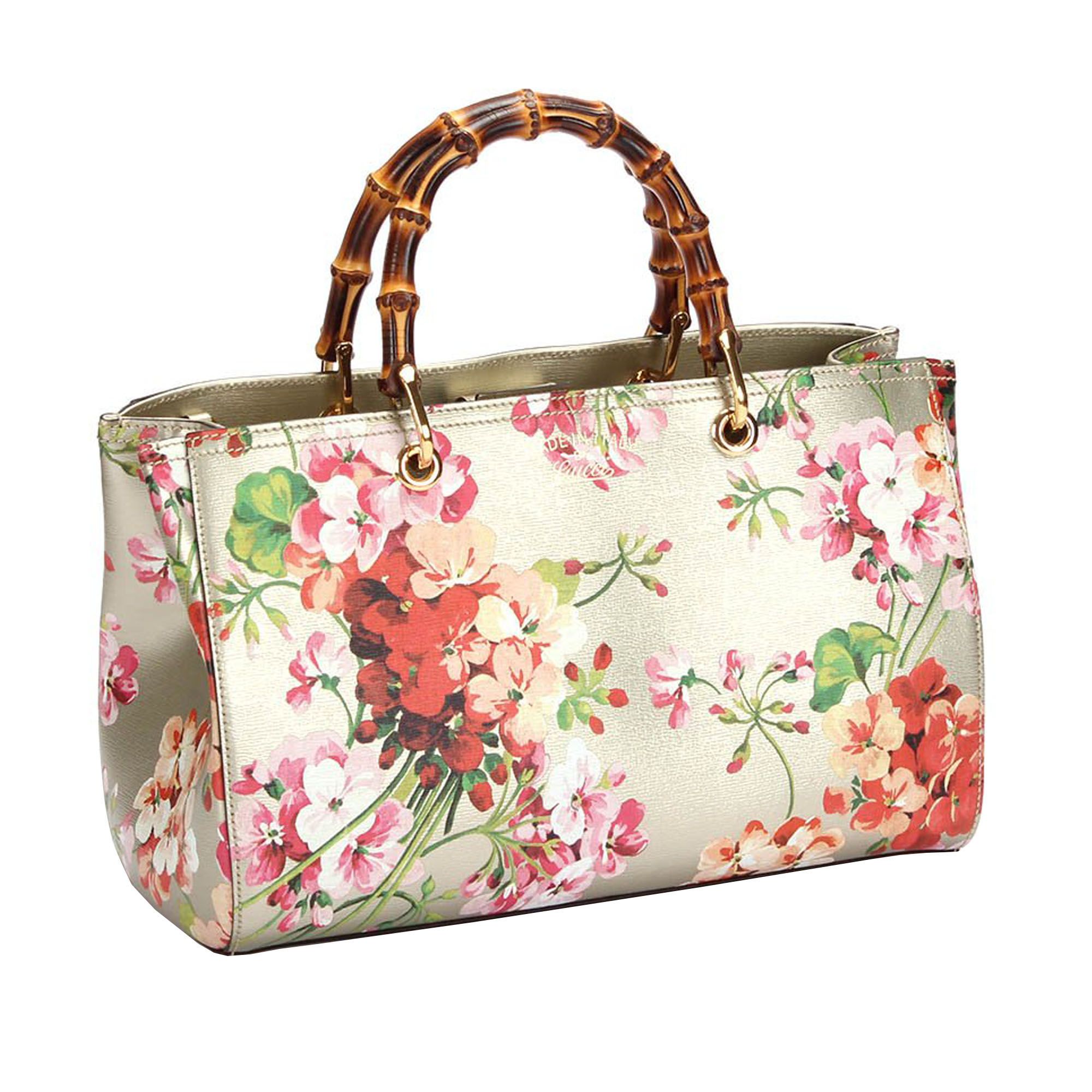 VINTAGE. RRP AS NEW. The Blooms Bamboo Shopper features a floral printed leather body, bamboo handles, a detachable flat strap, an open top with a magnetic closure, and interior zip and slip pockets.Exterior bottom is scratched. Studs is scratched.

Dimensions:
Length 21cm
Width 23cm
Depth 11.5cm
Hand Drop 10cm
Shoulder Drop 48cm

Original Accessories: Shoulder Strap, Dust Bag

Serial Number: 323660 001998
Color: White x Multi
Material: Leather x Calf x Natural Material x Bamboo
Country of Origin: ITALY
Boutique Reference: SSU115051K1342


Product Rating: VeryGoodCondition