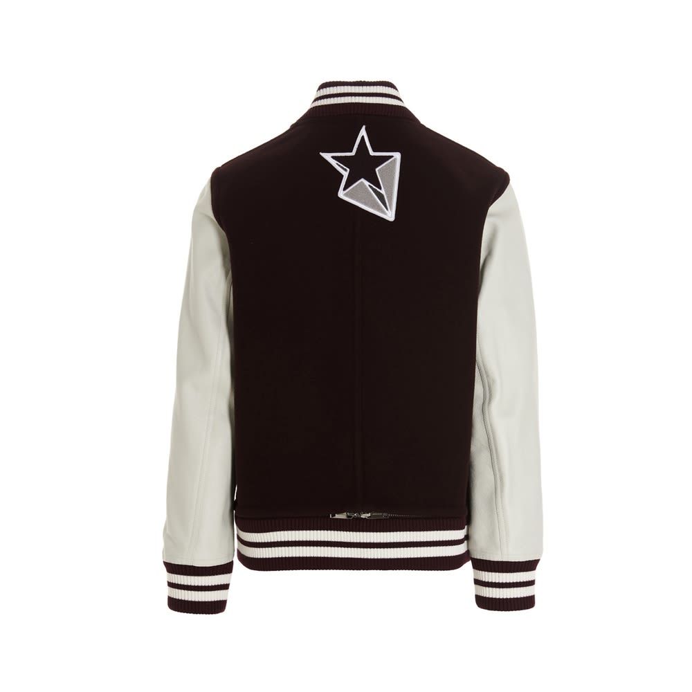 Tech wool varsity bomber jacket featuring leather sleeves, snap buttons, a double logo patch at the front and pockets.