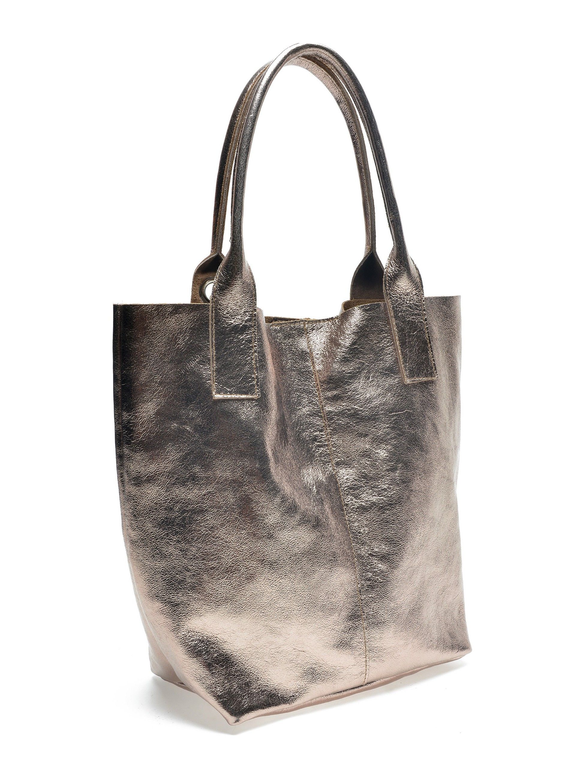 Tote Bag
100% cow leather
Magnetic clasp
Inner purse
Tassel detail 
Dimensions (L): 34x40x17 cm
Handle: 54 cm
Shoulder strap: /