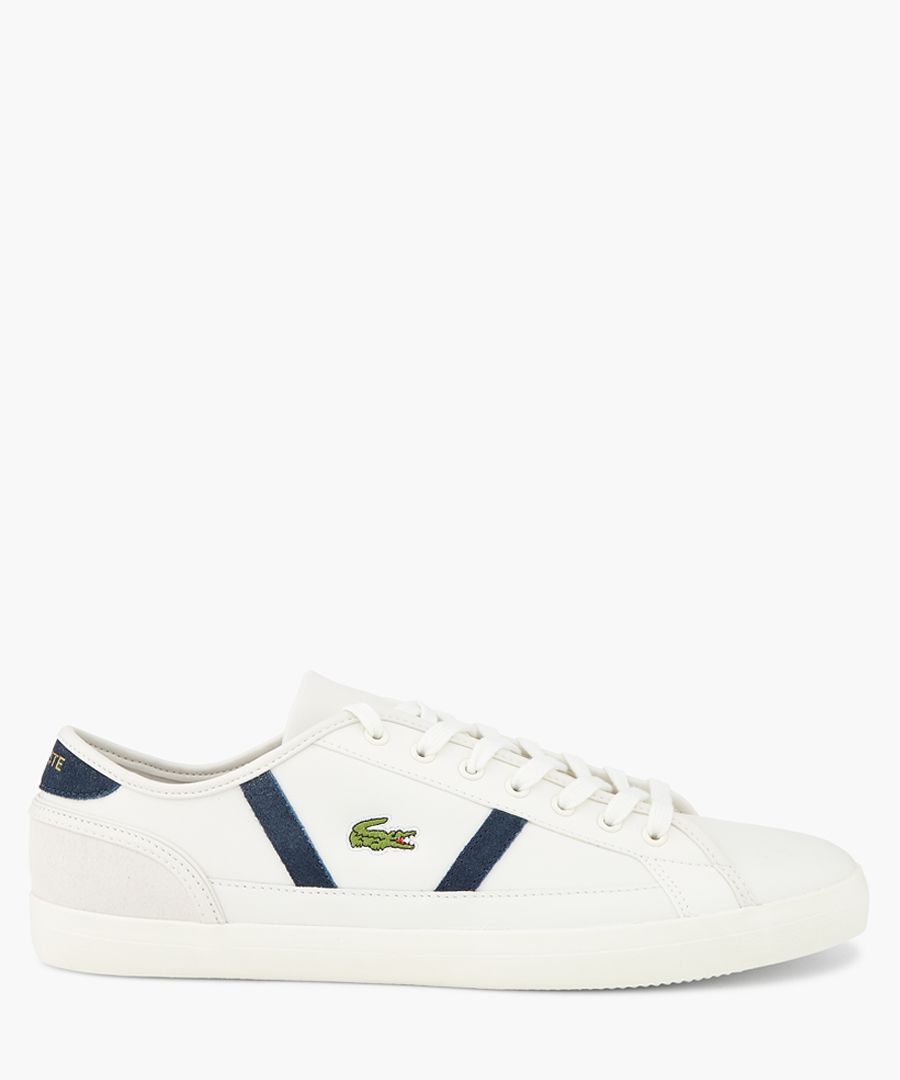 White and navy leather logo trainers