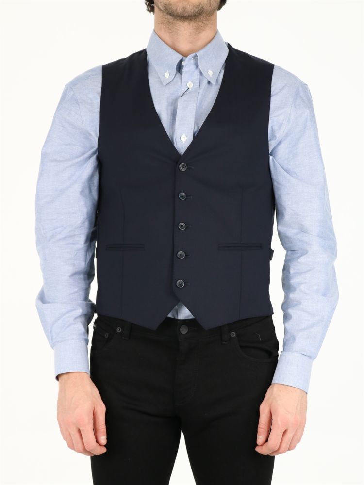 Single-breasted blue wool vest with button closure, front pockets and adjustable buckle on the back.The model is 185 cm tall and wears size 48IT / L