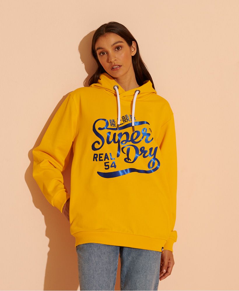 A classic Superdry design, the Heritage 16 Oversized Hoodie takes us back to our roots. Featuring a drawstring hood, two pockets, ribbed detailing and a textured graphic.Oversized fit – exaggerated and super relaxed, let your style flowDrawstring hoodTwo pocketsRibbed detailingLoopback liningTextured graphicSignature logo tab