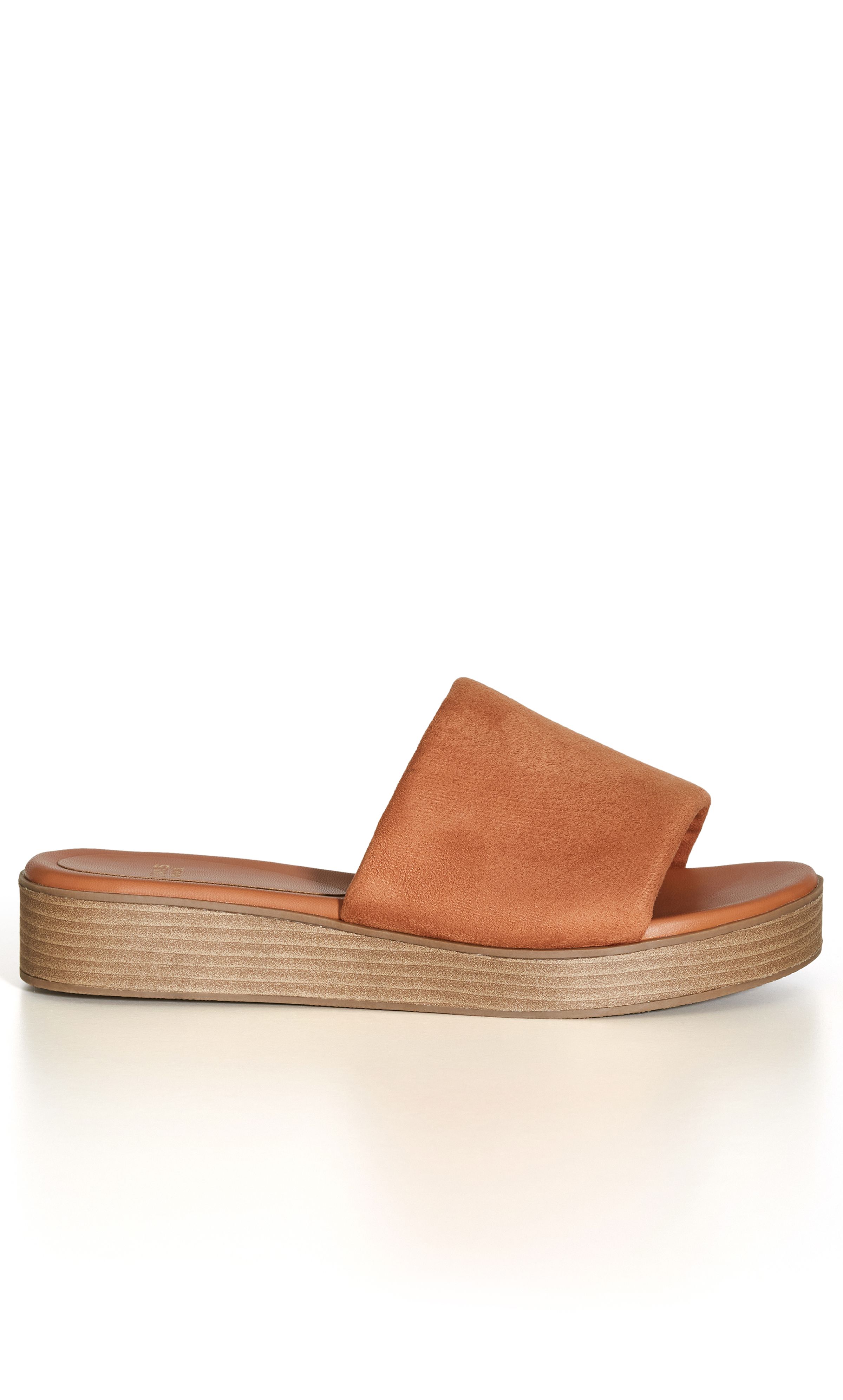 The Band Slide Wedge is summer's favourite shoe, offering an easy slip on style and stylish wood-stacked platform heel. Whether you're headed to the shops or having brunch with the girls, this chic pair has you covered! Key Features Include: - Round toe - Single thick band - Slip on style - Chunky wood-stacked platform sole - Low wedge heel Elevate your Saturday style with a V-neck top, pleated midi skirt and statement earrings.