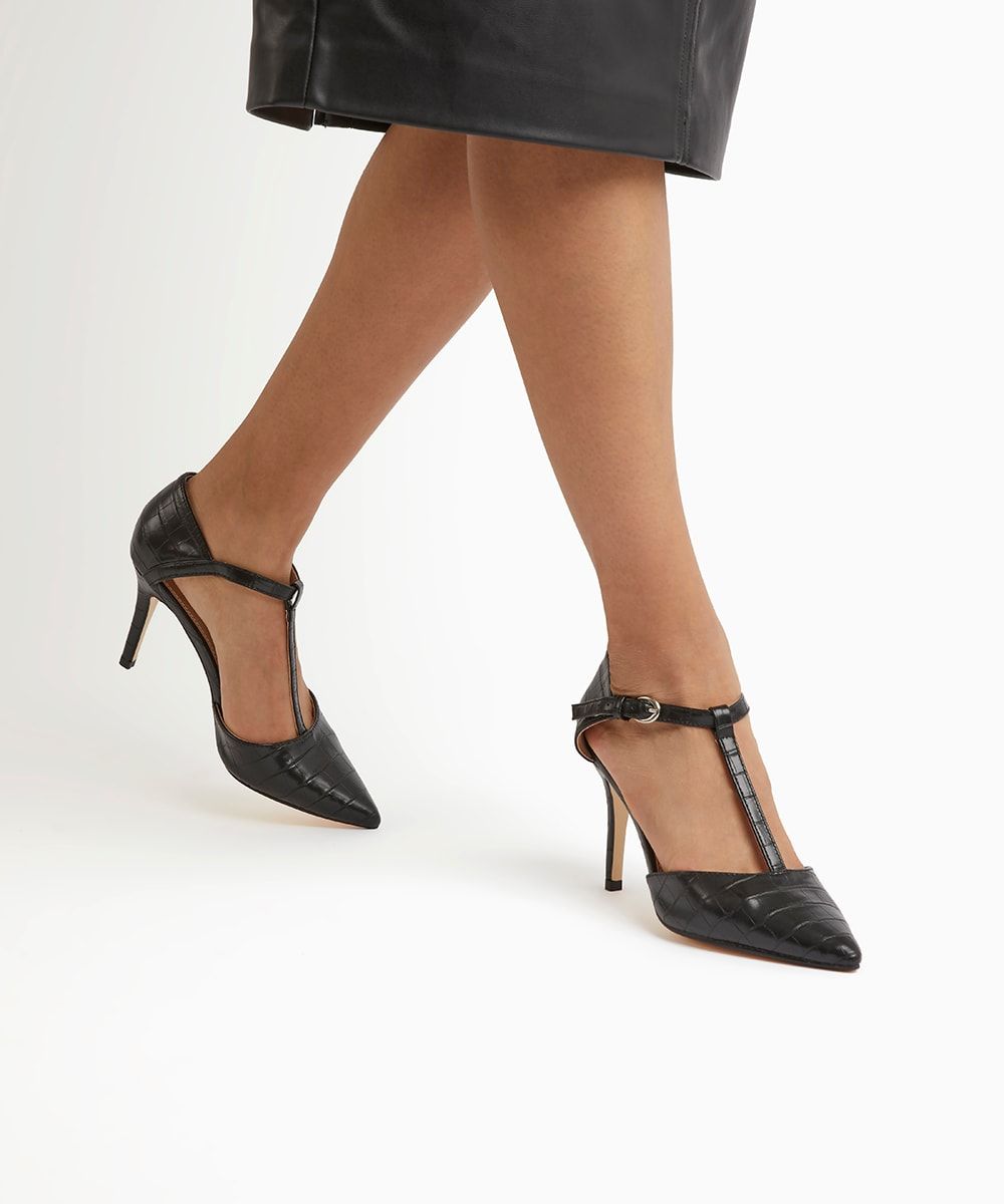 An elegant pair of T-bar courts in this season's must-have croc. Featuring an adjustable ankle strap with buckle fastening they rest on a stiletto heel. A versatile style you can dress up or down.