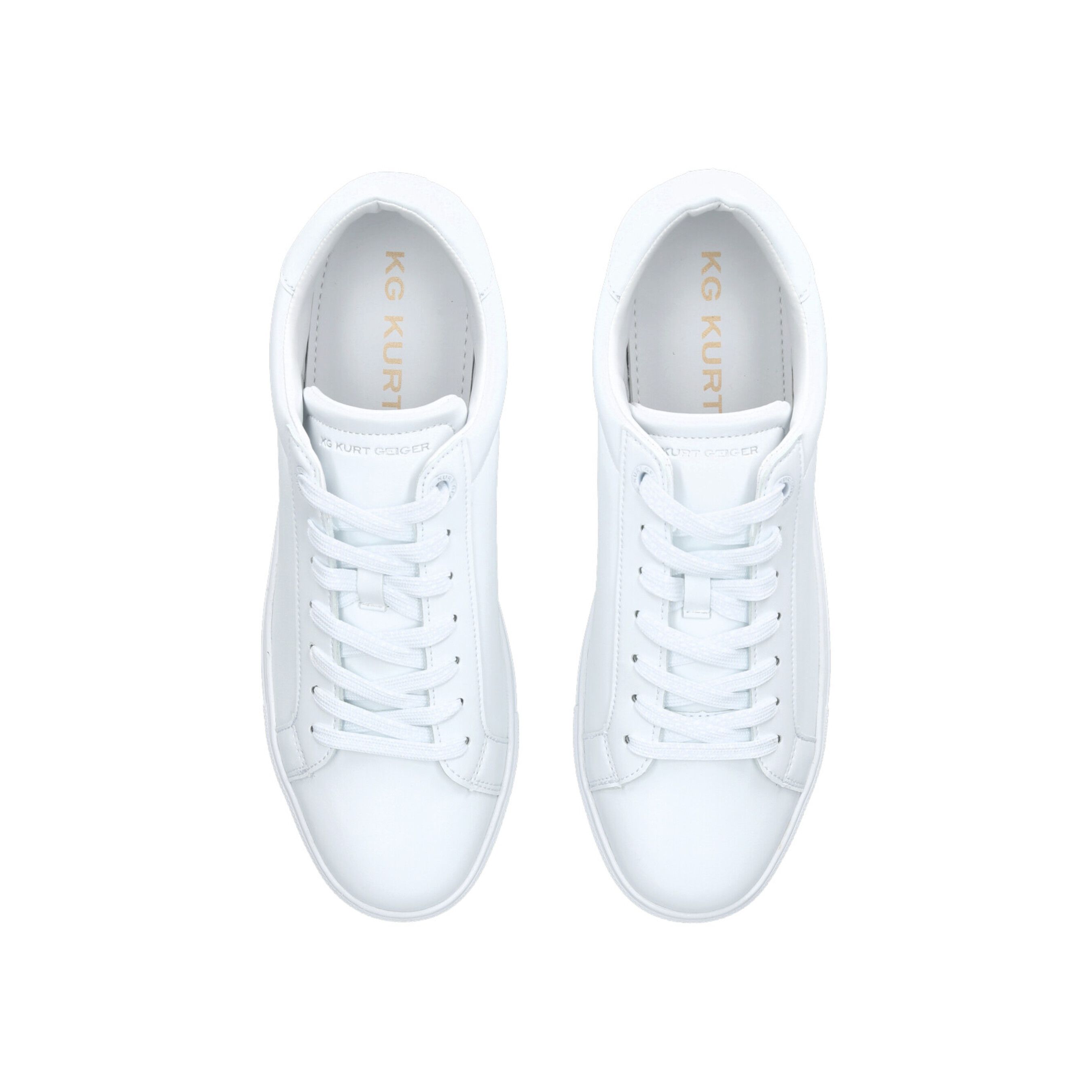 The Kacy is a classic sneaker in white. There is silver foil embossed branding on the tongue and a simple KG Kurt Geiger logo printed on ribbed textile with print stitch detailing tab at the back of the heel.