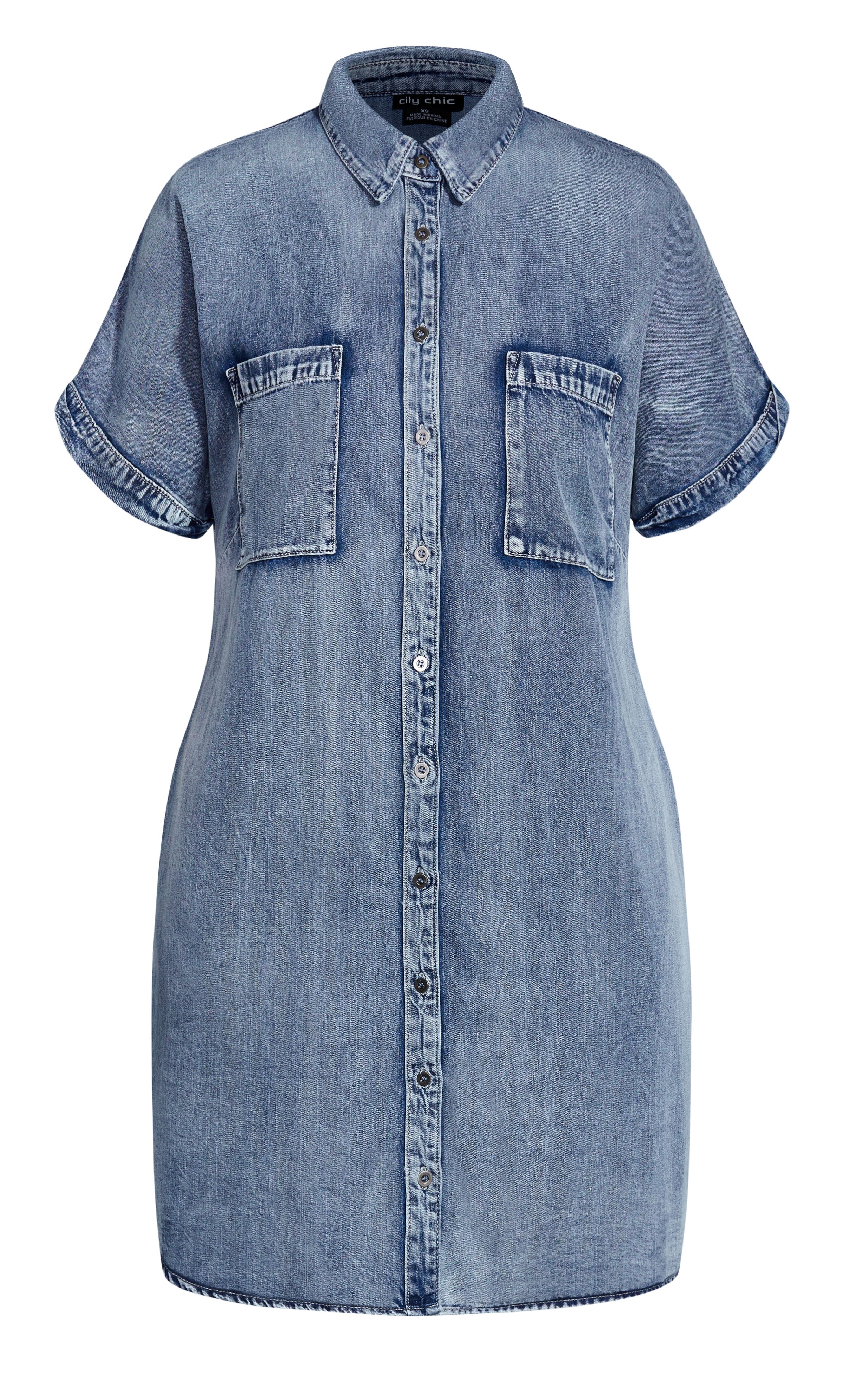 Elevated by a 100% Cotton denim fabrication, the Denim Sleek Dress is a sought after summer staple. It flaunts a workable button up front as well as handy side pockets to hold your everyday essentials. Key Features Include: - Collared neckline - Short cuffed sleeves - Buttoned front - Two breast pockets - Two side pockets - Breathable 100% Cotton fabrication - Unlined - Mini length Add ankle boots and oversized sunglasses for a mega cool street style aesthetic.
