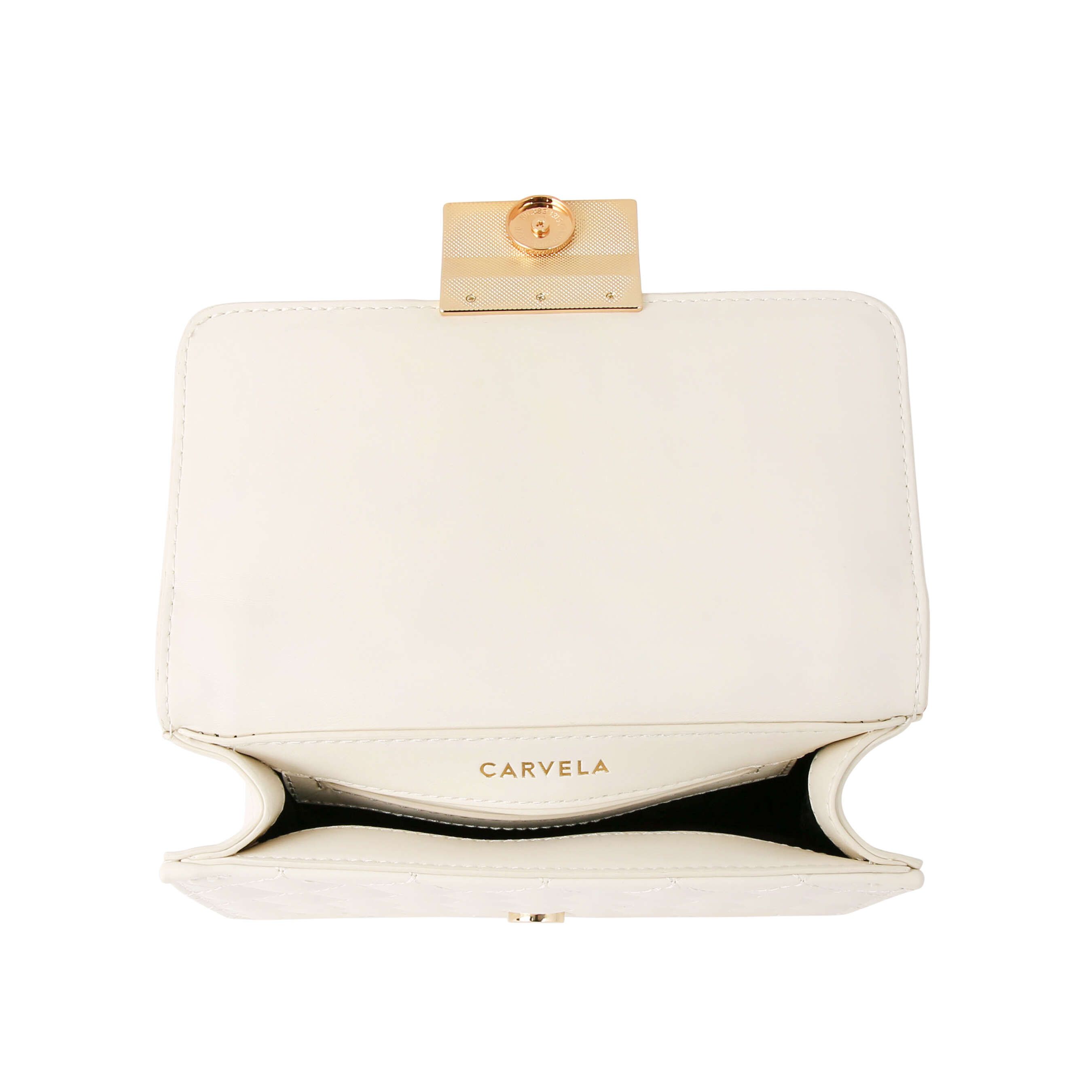 The Mini Bailey Cross Body is crafted in a bone leather alternative with overstitch quilted flap detail. There is a gold tone chain trim as well as gold tone branded plate closure. Dimensions: 13cm (H), 21cm (L), 7cm (D). Strap length: 116cm Strap drop: 59cm.