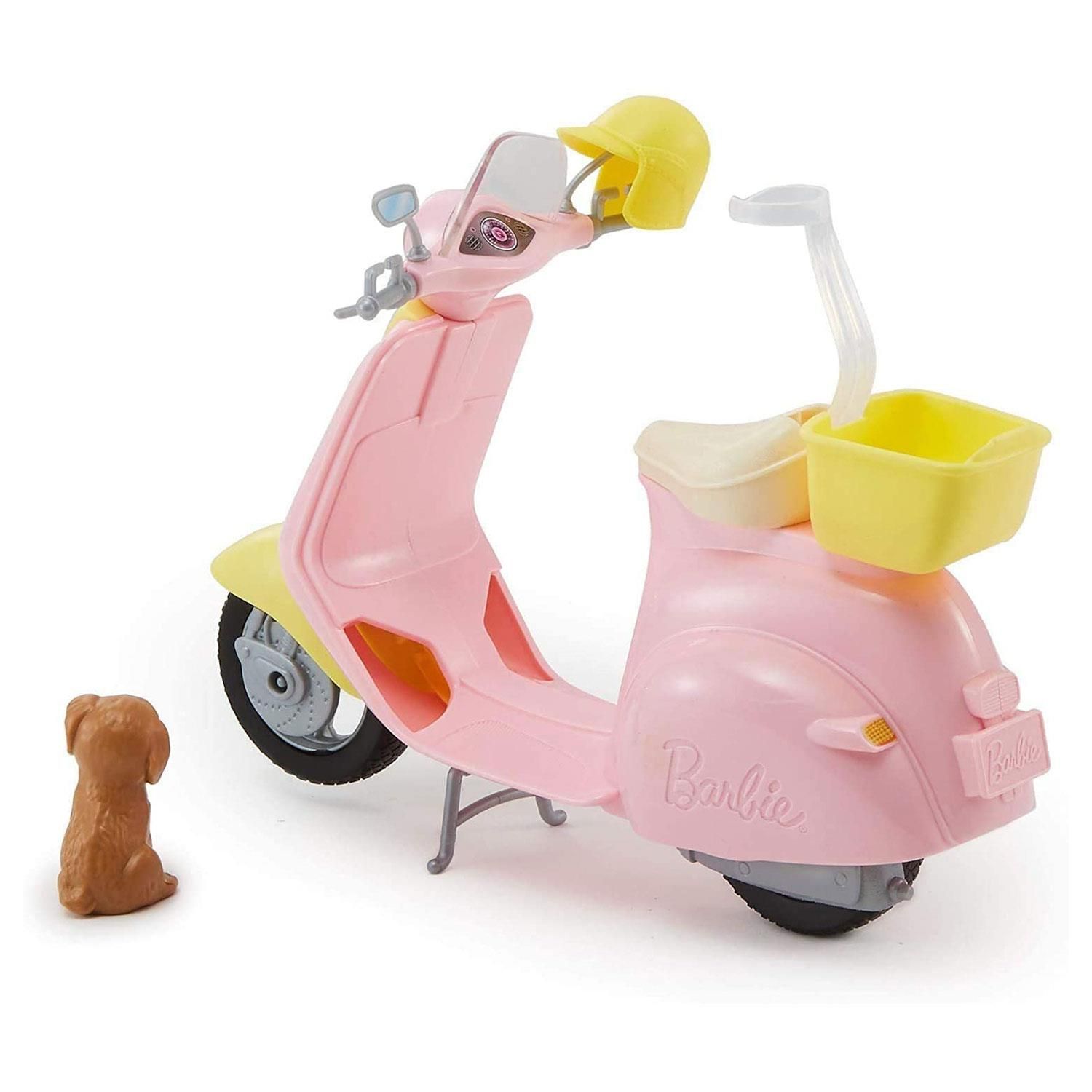 Scoot into fun with this Barbie moped. It comes with a pet friend who's always ready to ride! Designed in pink and yellow with silvery accents, the moped is trendy and stylish. Place Barbie doll (sold separately) on the seat where a clip holds her in place. Lift up the kickstand and push to head into imagination. Bring along the puppy in the yellow basket on the back. And a yellow helmet for the Barbie doll lets her ride safely in style. Whether you are going for a short ride or driving into adventure, this moped is ready to roll! Includes Barbie moped with basket, puppy, and helmet; doll not included. Colors and decorations may vary.