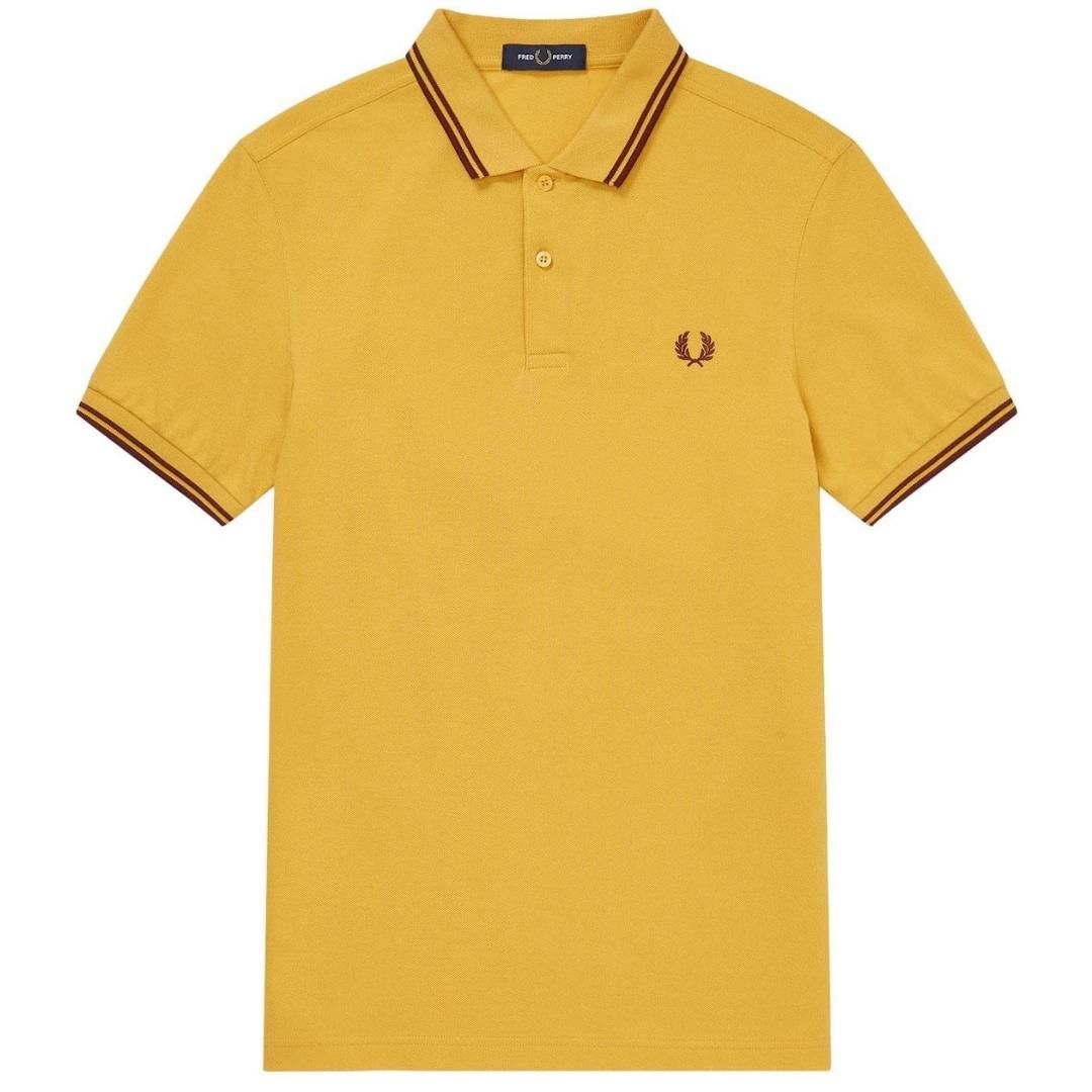 Fred Perry Twin Tipped M3600 480 Yellow Polo Shirt. Fred Perry Yellow Polo Shirt. Pattern On Collar. Button Closure At The Neck. 100% Cotton. Style: M3600 480