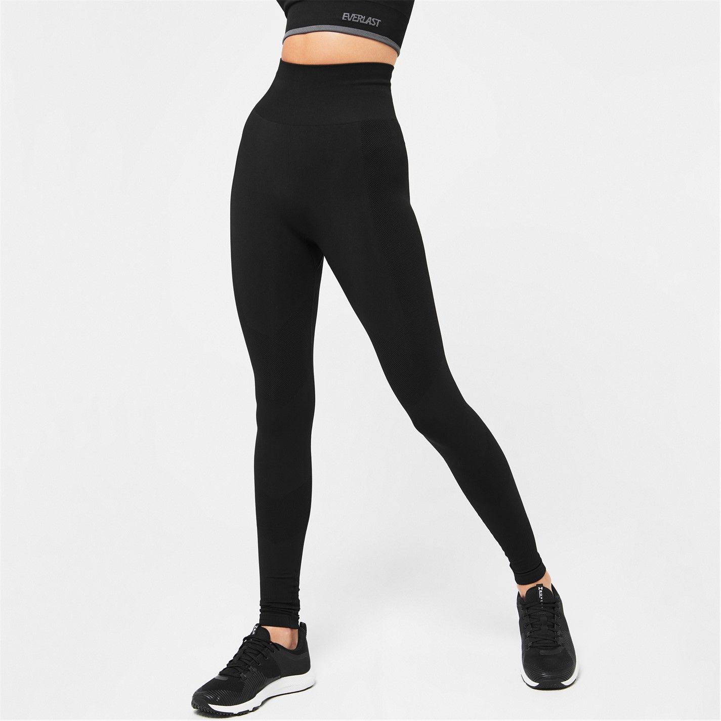 Everlast Super High Waisted Racer Leggings Feel flexible, comfortable and supported with these Everlast super-high waisted racer leggings. Equipped with our signature seamless technology, these leggings are fully flexible allowing for ultimate mobility and movement. Plus the sweat wicking technology will keep you dry during your workout, in a squat proof design. These are a slim fit, flattering any figure this season.  >High rise  >Seamless  >Sweat wicking  >Slim fit  >Squat proof  >Original 90% Nylon 10% Elastane  >New style: 92% Nylon 8% Elastane  >Machine washable