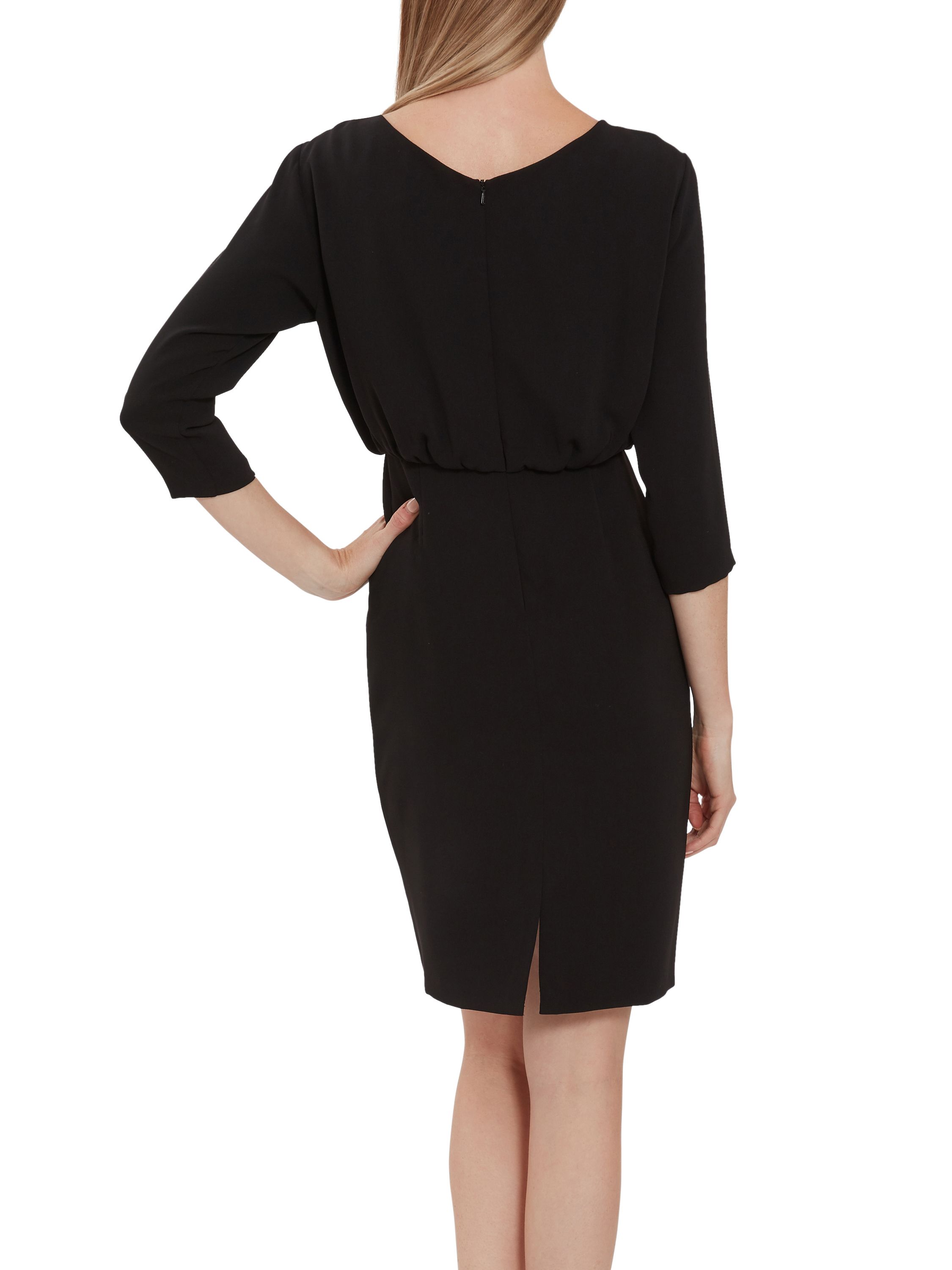 Feel fabulous in this soft crepe dress by Gina Bacconi. It has 1/2 length sleeves and delicate ruching at the waistline with cowl neck detailing for an elegant finish. The dress is fully lined.
