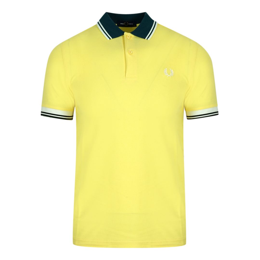 Fred Perry Twin Tipped M4567 I27 Yellow Polo Shirt. Fred Perry Yellow Polo Shirt. Pattern On Collar. Button Closure At The Neck. 100% Cotton. Style: M4567 I27
