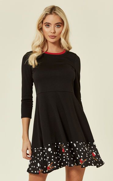 The Pearls Dream mini long-sleeved dress in black is perfect for work or casual drinks. Easy to dress up or down, this playful skater dress is the perfect choice for those throw-down days when you just want throw something on and still look amazing. Featuring three quarter length sleeves, a red collar stripe and polka dot hem details, this little black dress is sure to impress.