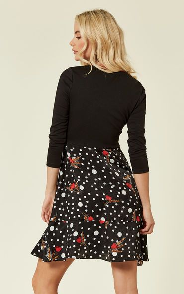 The Florence mini long-sleeved dress in black is perfect for work or casual drinks. Easy to dress up or down, this playful skater dress is the perfect choice for those throw-down days when you just want throw something on and still look amazing. Featuring three quarter length sleeves, a red collar stripe and polka dot hem details, this little black dress is sure to impress.