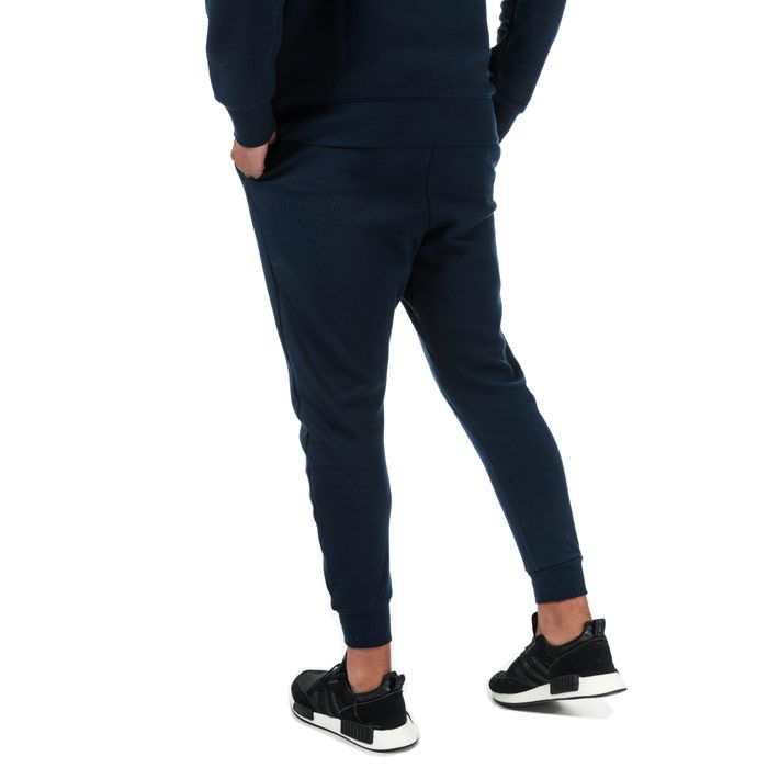 Mens Reebok Classics Fleece Pants in collegiate navy.<BR><BR>- Elasticated waistband with inner drawcord.<BR>- Side welt pockets.<BR>- Ribbed cuffs.<BR>- Reebok Classics Starcrest logo embroidered at left thigh.<BR>- Slim fit.<BR>- Main material: 80% Organic cotton  20% Polyester.  Rib: 95% Cotton  5% Elastane.  Machine washable.<BR>- Ref: DT8134