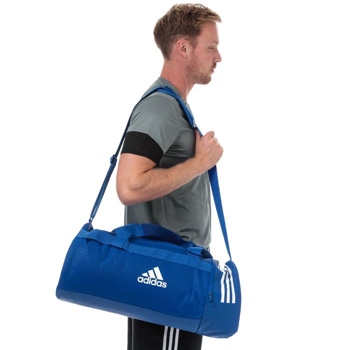 adidas Convertible 3-Stripes Duffel Bag - Medium in bold blue - white.<BR><BR>- Main compartment with dual zip fastening.<BR>- Three inner slip pockets.<BR>- Zipped side pockets.<BR>- Convertible duffel-to-backpack construction.<BR>- Adjustable webbing shoulder strap with padding.<BR>- Webbing carry handles with padding.<BR>- 3-Stripes printed to side.<BR>- adidas Badge Of Sport logo to front.<BR>- Dimensions: 27cm (H) x 58cm (W) x 27cm (D) approximately.<BR>- Main material: 100% Polyester.  Lining: 100% Polyester.  Padding: 100% Polyethylene.  Sponge clean only.<BR>- Ref: DT8657<BR><BR>Measurements are intended for guidance only.