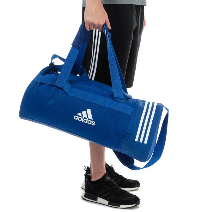 adidas Convertible 3-Stripes Duffel Bag - Medium in bold blue - white.<BR><BR>- Main compartment with dual zip fastening.<BR>- Three inner slip pockets.<BR>- Zipped side pockets.<BR>- Convertible duffel-to-backpack construction.<BR>- Adjustable webbing shoulder strap with padding.<BR>- Webbing carry handles with padding.<BR>- 3-Stripes printed to side.<BR>- adidas Badge Of Sport logo to front.<BR>- Dimensions: 27cm (H) x 58cm (W) x 27cm (D) approximately.<BR>- Main material: 100% Polyester.  Lining: 100% Polyester.  Padding: 100% Polyethylene.  Sponge clean only.<BR>- Ref: DT8657<BR><BR>Measurements are intended for guidance only.