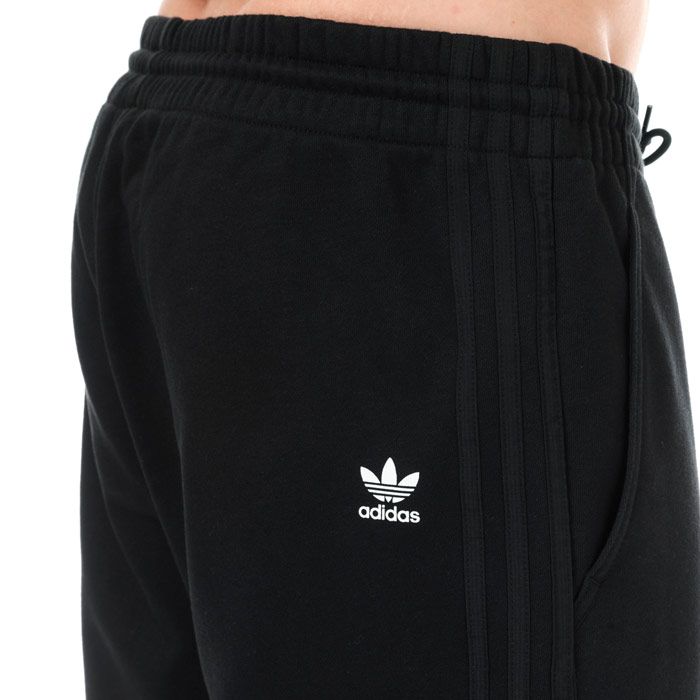 Mens adidas Originals PT3 Sweat Pants in black.<BR><BR>- Elasticated waistband with drawcord.<BR>- Front slant pockets.<BR>- Gusseted crotch.<BR>- Ripstop fabric at lower inner legs.<BR>- Applied 3-Stripes to sides.<BR>- Trefoil logo printed at right rear side.<BR>- Open hems.<BR>- Tapered leg.<BR>- Regular fit.<BR>- Main material: 70% Cotton  30% Recycled polyester.  Machine washable.<BR>- Ref: DV1970