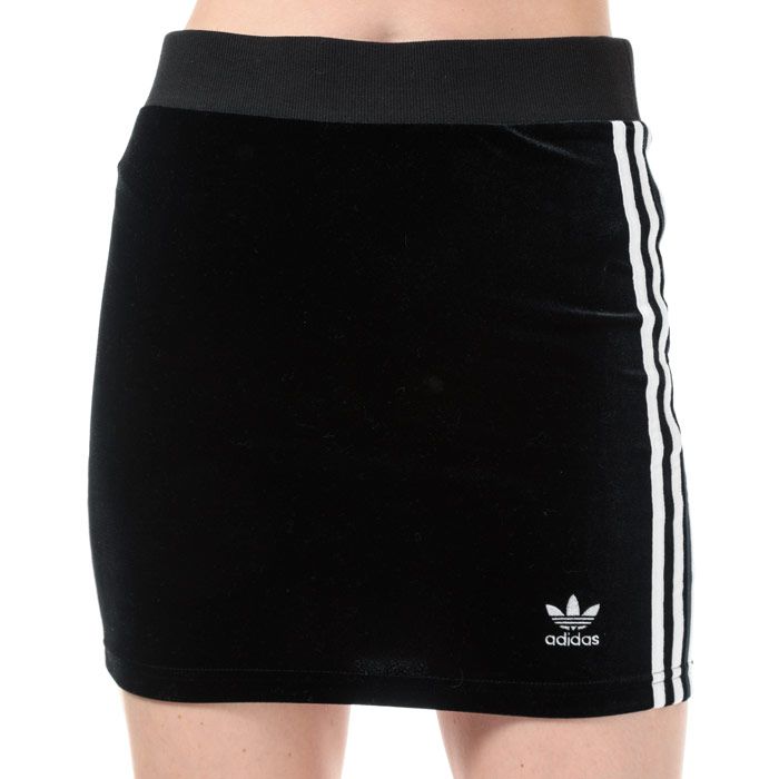 Womens adidas Originals 3-Stripes Skirt in black.<BR><BR>Sporty pencil skirt crafted from soft plush velour.<BR>- Ribbed elasticated waist.<BR>- Applied 3-Stripes to sides.<BR>- Embroidered Trefoil logo above left hem.<BR>- Tight fit.<BR>- Measurement from waist to hem: 16“ approximately.  <BR>- Main material: 93% Polyester  7% Elastane.  Machine washable.<BR>- Ref: DV2628<BR><BR>Measurements are intended for guidance only.