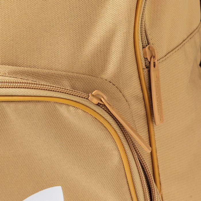 adidas Originals Classic Trefoil Backpack in raw sand.<BR><BR>- One main zip compartment.<BR>- Front zip pocket.<BR>- Inner laptop compartment.<BR>- Padded shoulder straps with zigzag stitching.<BR>- Webbing carry handle to top.<BR>- Trefoil branding to front.<BR>- Dimensions: 42cm (H) x 28.5cm (W) x 15cm (D) approximately.<BR>- Main material: 100% Polyester.  Lining: 100% Polyester.  Padding: 100% Polyethylene.<BR>- Ref: DW5186<BR><BR>Measurements are intended for guidance only