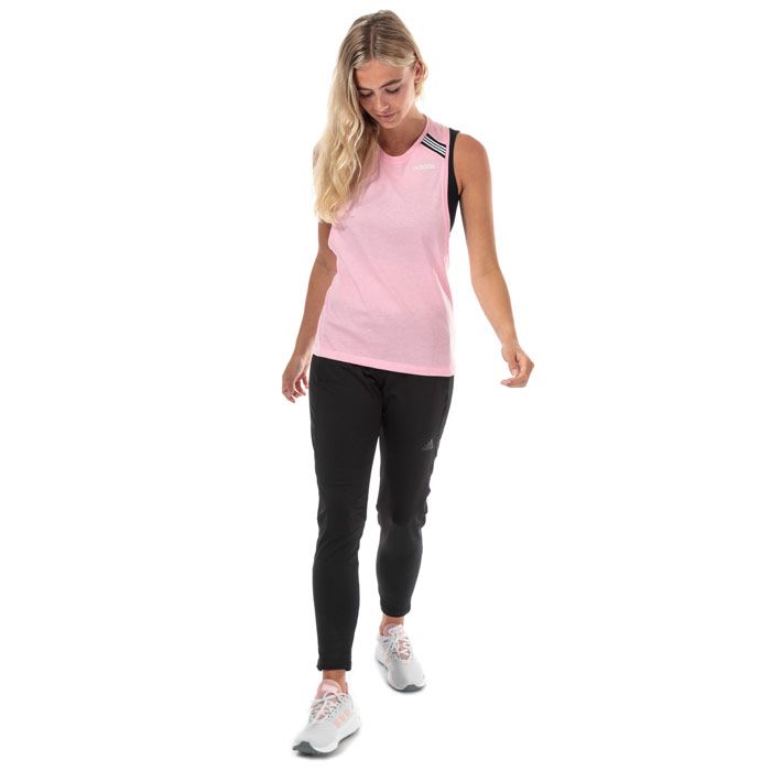 Womens adidas Racerback Cotton Tank in true pink.<BR><BR>- Crew neck.<BR>- Contrast 3-Stripes mesh insert at shoulders.<BR>- Sleeveless with dropped armholes for freedom of motion.<BR>- Racerback construction for freedom of movement at the shoulders.<BR>- adidas linear logo printed at left chest.<BR>- Contrast back neck tape.<BR>- Soft cotton blend construction.<BR>- Regular fit.<BR>- Measurement from shoulder to hem: 23“ approximately.  <BR>- Body: 60% Cotton  40% Polyester.  Machine washable.<BR>- Ref: DW9926<BR><BR>Measurements are intended for guidance only.