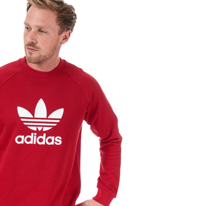 Mens adidas Originals Trefoil Warm-Up Crew Sweatshirt in power red.<BR><BR>Classic crew sweat  crafted from soft French terry.<BR>- Ribbed crew neck.<BR>- Long raglan sleeves.<BR>- Ribbed cuffs and hem.<BR>- Large rubber print Trefoil logo at centre chest.<BR>- Regular fit.<BR>- Measurement from shoulder to hem: 28in approximately.<BR>- Main material: 100% Cotton.  Rib: 95% Cotton  5% Elastane.  Machine washable.<BR>- Ref: DX3615<BR><BR>Measurements are intended for guidance only.