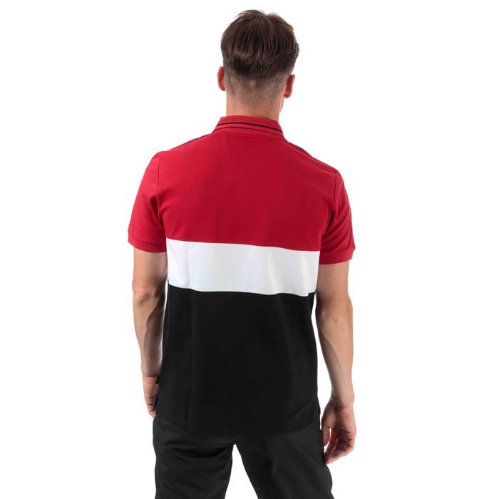Mens adidas Manchester United Polo Shirt in real red - white - black.<BR><BR>- Ribbed polo collar with contrast tipping.<BR>- 3 button placket.<BR>- Short sleeves with ribbed cuffs.<BR>- Applied 3-Stripes at shoulders and sleeves.<BR>- Even vented hem.<BR>- Manchester United embroidered crest at left chest.<BR>- Embroidered adidas Badge of Sport logo at right chest.<BR>- Tonal back neck tape.<BR>- Slim fit.<BR>- Main material: 58% Cotton  42% Polyester.  Rib: 50% Cotton  42% Polyester  3% Elastane.  Machine washable.<BR>- Ref: DX9068