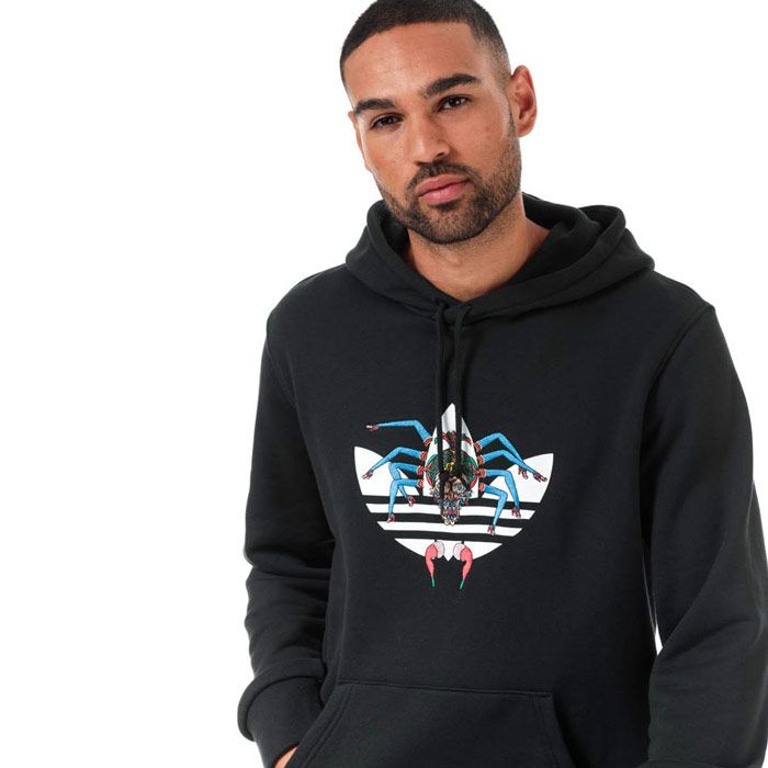 Mens adidas Originals Tanaami Hoody in black. – Created in collaboration with Japanese artist Keiichi Tanaami. – Drawcord-adjustable hood. – Long sleeves. – Printed Trefoil logo to front with embroidered graphic. – Kangaroo style pocket to front. – Ribbed cuffs and hem. – Regular fit. – Main material: 100% Cotton.  Hood lining: 100% Cotton.  Machine washable. – Ref: DY6691