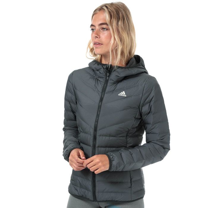 Womens adidas Varilite 3-Stripes Hooded Down Jacket in carbon.<BR><BR>- Water resistant down stays dry longer and maintains a higher loft to retain warmth even when wet.<BR>- adidas conextbaffles stable down chambers are weaved into the material and connected without using any additional thread for better wind- and water resistance.<BR>- Fixed hood with reflective 3-Stripes and stretch binding trim.<BR>- Full zip fastening with chin guard and inner storm placket. <BR>- Elasticated cuffs with stretch binding trim.<BR>- Zipped front seam pockets.<BR>- Headphones channel in right pocket.<BR>- Inner slip pockets.<BR>- Reflective adidas Badge of Sport logo printed at left chest.<BR>- Slim fit.<BR>- Measurement from shoulder to hem: 23in approximately.  <BR>- Body: 100% Polyester.  Pockets: 100% Polyester.  Filling: 80% Duck down  20% Feather.  Machine washable.<BR>- Ref: DZ1520<BR><BR>Measurements are intended for guidance only.