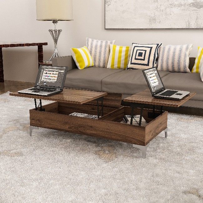 This stylish and functional coffee table is the perfect solution for furnishing the living area and keeping magazines and small items tidy. Easy-to-clean, easy-to-assemble kit included. Color: Walnut | Product Dimensions: W121xD60xH30 cm | Material: Melamine Chipboard, Metal | Product Weight: 24,8 Kg | Supported Weight: 20 Kg | Packaging Weight: W127xD55xH12 cm Kg | Number of Boxes: 1 | Packaging Dimensions: W127xD55xH12 cm.
