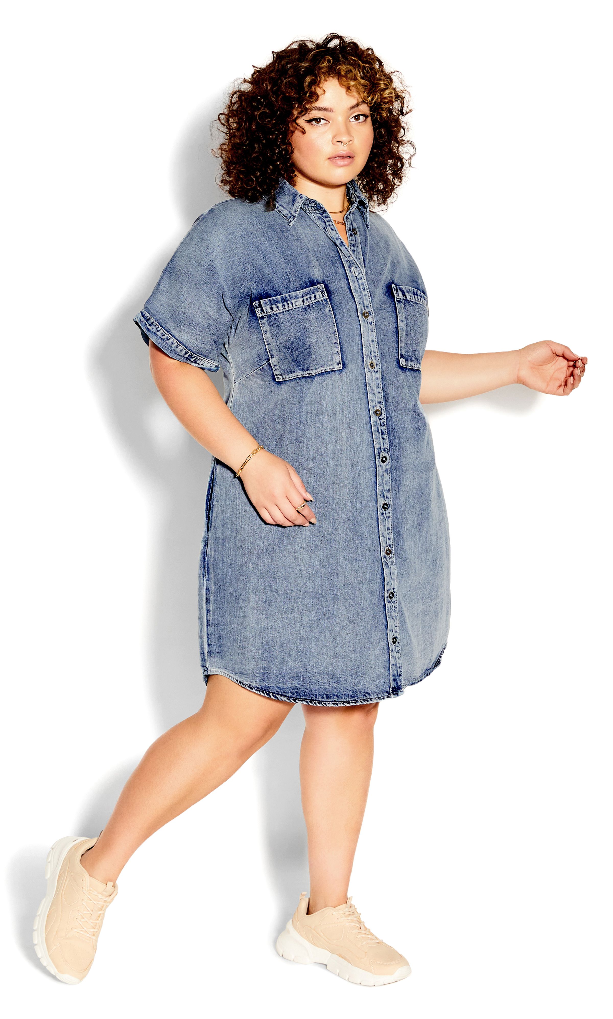 Elevated by a 100% Cotton denim fabrication, the Denim Sleek Dress is a sought after summer staple. It flaunts a workable button up front as well as handy side pockets to hold your everyday essentials. Key Features Include: - Collared neckline - Short cuffed sleeves - Buttoned front - Two breast pockets - Two side pockets - Breathable 100% Cotton fabrication - Unlined - Mini length Add ankle boots and oversized sunglasses for a mega cool street style aesthetic.