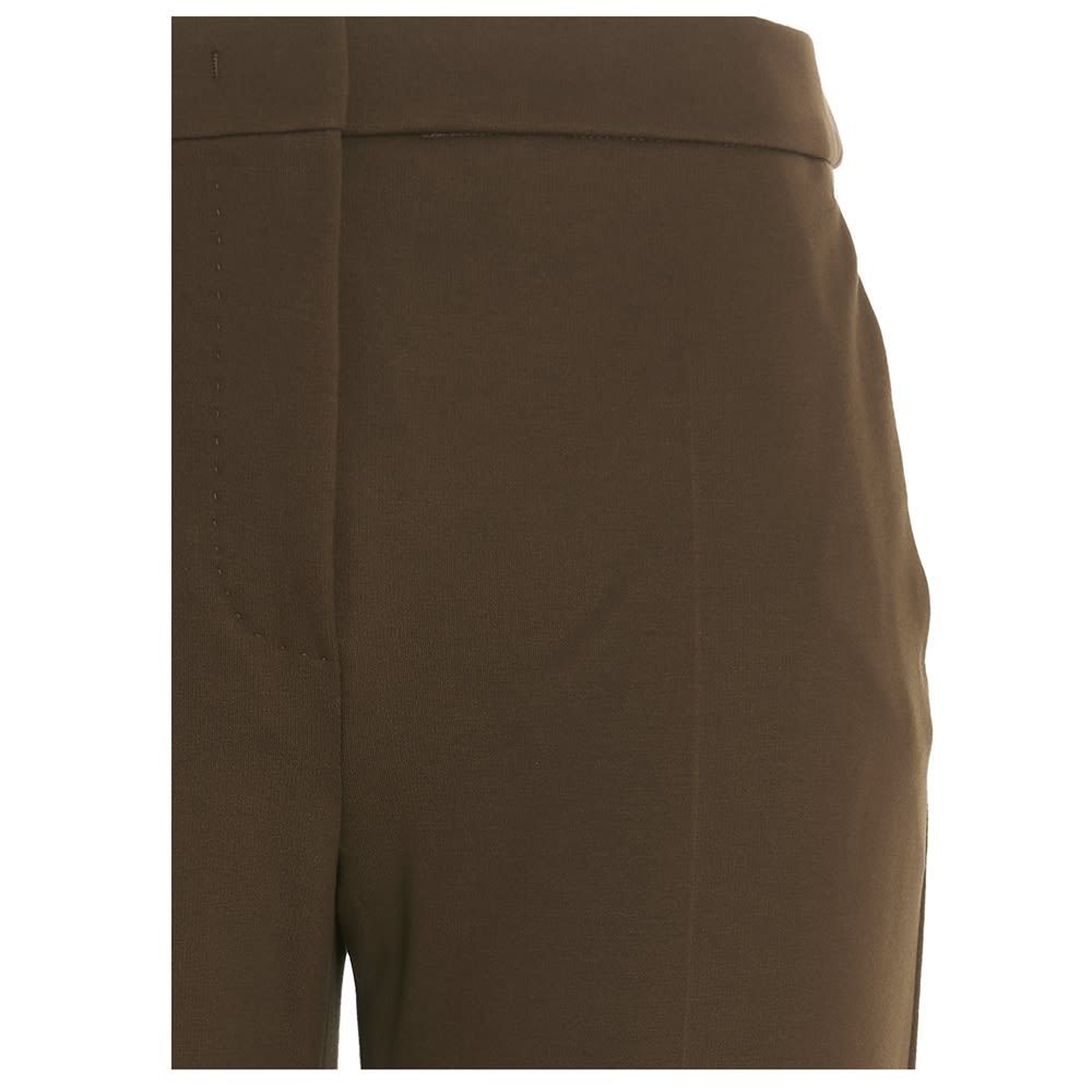 'Pegno' viscose jersey trousers with a zip, hook-and-eye and button closure, and a pleat on the front.