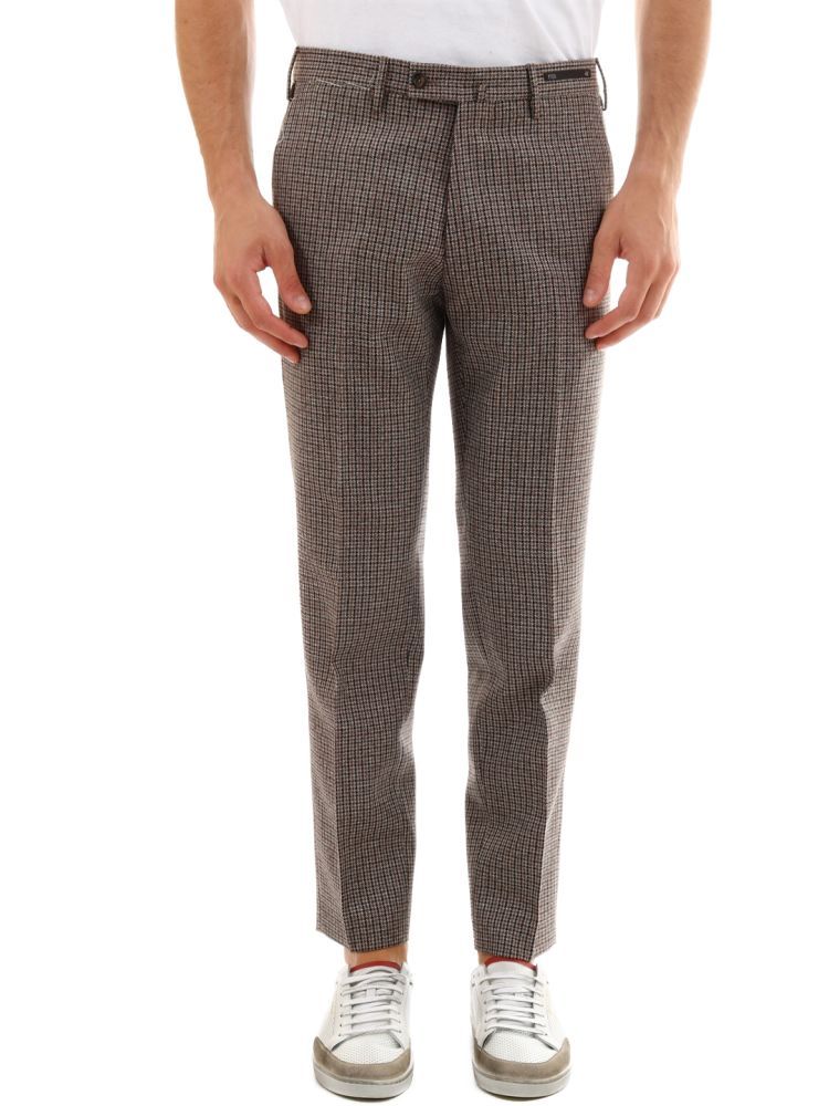 Checked wool trousers.The model is 1.85 cm tall and wears size 46