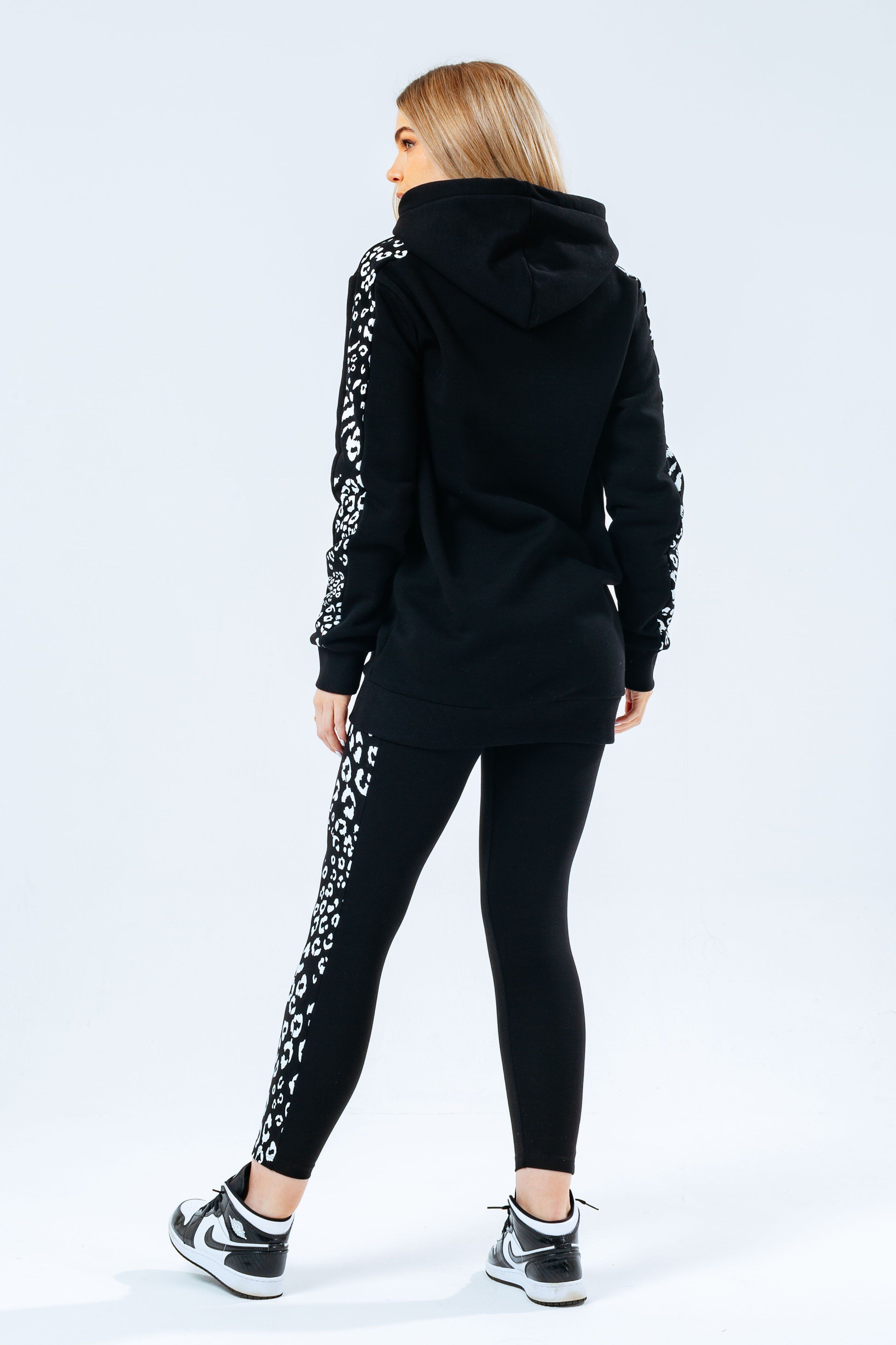 The Hype Black print longline women's hoodie and leggings set is perfect for off-duty casual days. Designed in a black fabric base with the ultimate soft-touch sweat fabric for supreme comfort. The womens hoodie highlights a fixed hood, fitted hem and cuffs, printed animal panels on the arms, finished with the iconic HYPE. signature logo in white embroidered across the front. The leggings boast an elasticated waistband and printed animal side panels across the leg. Wear stand alone or as a set with a pair of box fresh kicks to complete the look. Machine wash at 30 degrees.