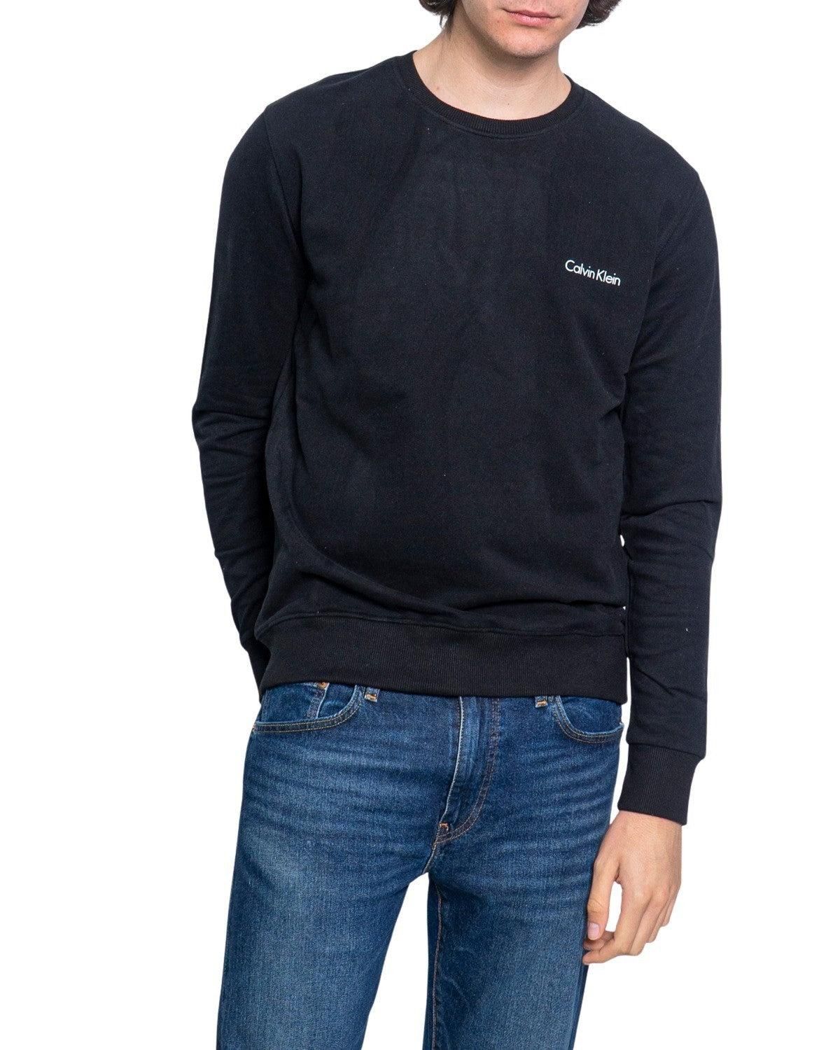 Brand: Calvin Klein Jeans
Gender: Men
Type: Sweatshirts
Season: Spring/Summer

PRODUCT DETAIL
• Color: black
• Pattern: plain
• Fastening: slip on
• Sleeves: long
• Neckline: round neck

COMPOSITION AND MATERIAL
• Composition: -100% cotton 
•  Washing: machine wash at 30°