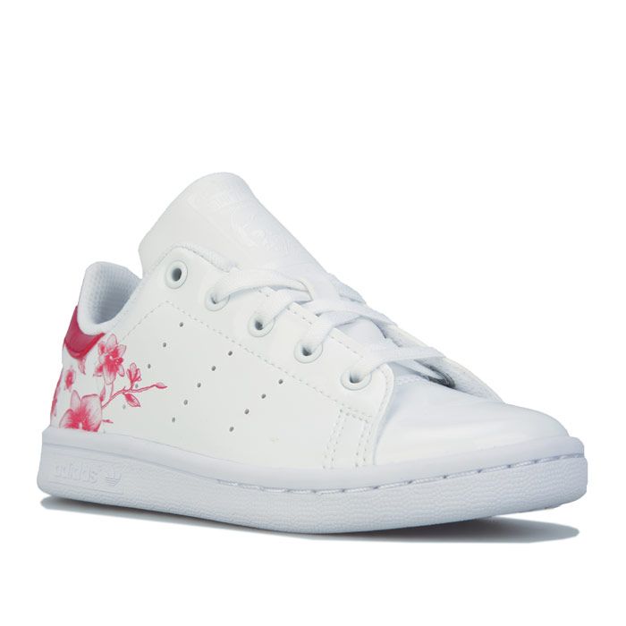 Children Girls adidas Originals Stan Smith Trainers in White Pink. – Premium leather upper. – Classic lace-up construction. – Synthetic leather heel patch with printed Stan Smith logo. – Tonal Stan Smith branding printed on tongue. – Perforated 3-Stripes branding on the sides. – Comfortable textile lining. – Removable Ortholite sockliner for comfort and odour control. – Padded collar. – Rubber outsole. – Leather upper – Leather and textile lining – Synthetic sole. – Ref: FW4494C