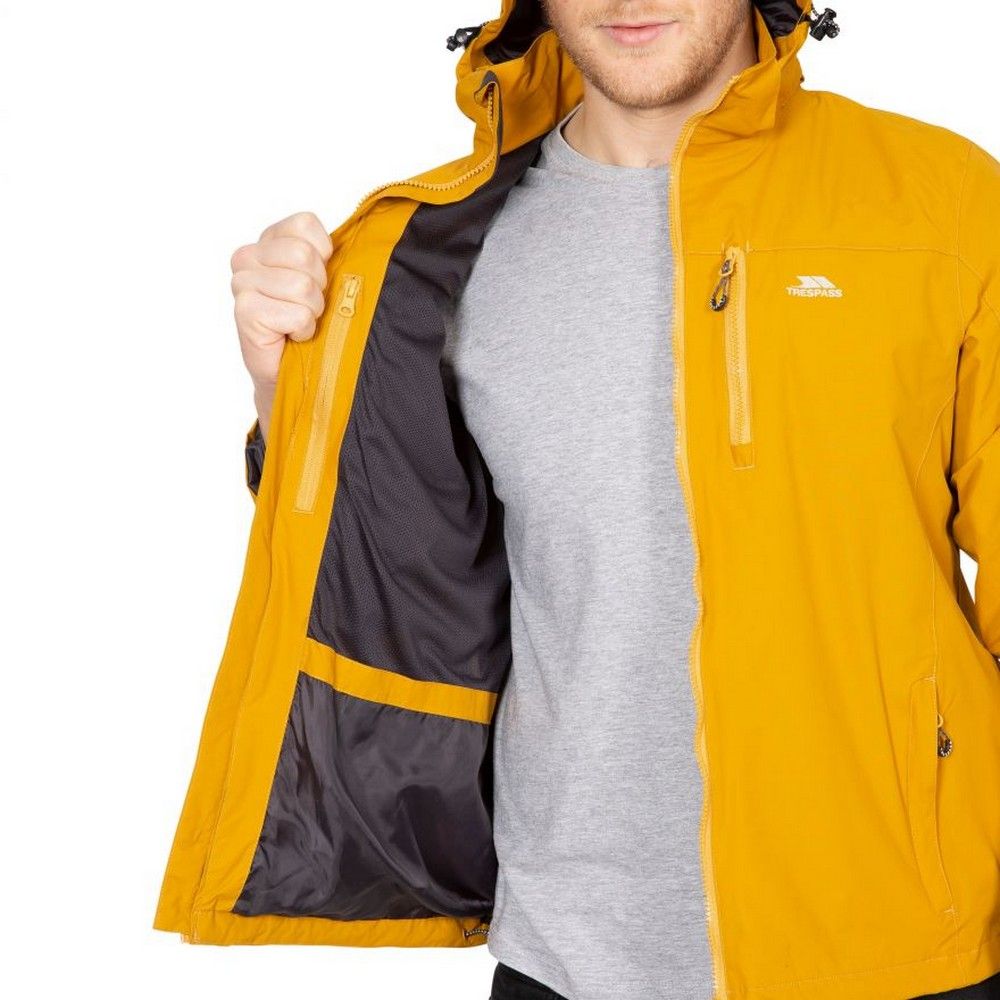 Shell: 100% Polyamide, PU coating, Lining: 100% Polyester. 3 zip pockets. Elasticated cuffs with touch fastening adjusters. Detachable zip off hood. Hem drawcord. Waterproof 3000mm, windproof, taped seams. Trespass Mens Chest Sizing (approx): S - 35-37in/89-94cm, M - 38-40in/96.5-101.5cm, L - 41-43in/104-109cm, XL - 44-46in/111.5-117cm, XXL - 46-48in/117-122cm, 3XL - 48-50in/122-127cm.