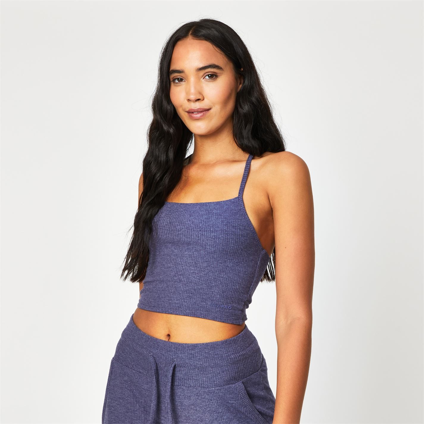 Take comfort to the next level with the USA Pro ribbed crop top, featuring a fashionably flattering square neckline. The soft-touch fabric and ribbed design will keep you feeling cosy while a unique strap detail features a stylish twist. Pair with the USA Pro ribbed joggers for a complete loungewear set.