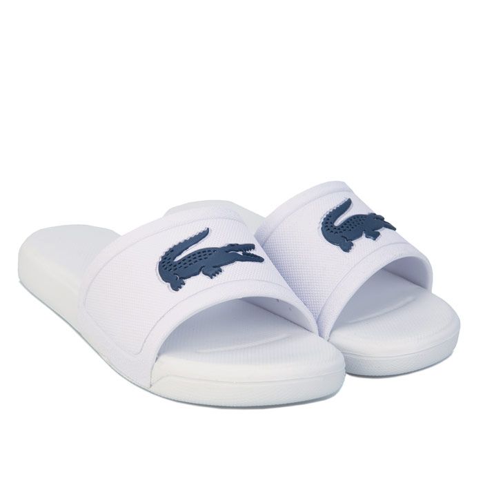 Children Boys Lacoste L.30 Slide Sandals in white blue.- Synthetic upper.- Slip on construction.- Injection-moulded EVA outsole.- Large crocodile branding on the strap.- Bold colourways bring a strong aesthetic to the poolside.- Synthetic upper  Synthetic lining  Synthetic sole.- Ref: 741CUC0008X96