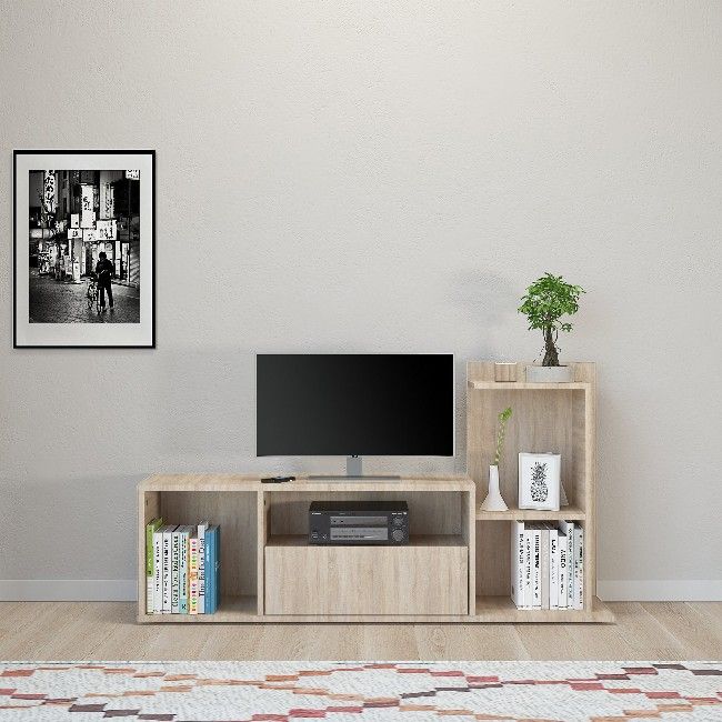 This stylish and functional TV cabinet is the perfect solution for television and all digital devices. Suitable for keeping accessories in order. Thanks to its design it is ideal for the living area. Easy-to-clean and easy-to-assemble assembly kit included. Color: Sonoma | Product Dimensions: W120xD30xH65 cm | Material: Melamine Chipboard | Product Weight: 21,20 Kg | Supported Weight: Each Shelf 5Kg | Packaging Weight: 24,00 Kg | Number of Boxes: 1 | Packaging Dimensions: W129xD44xH12 cm.