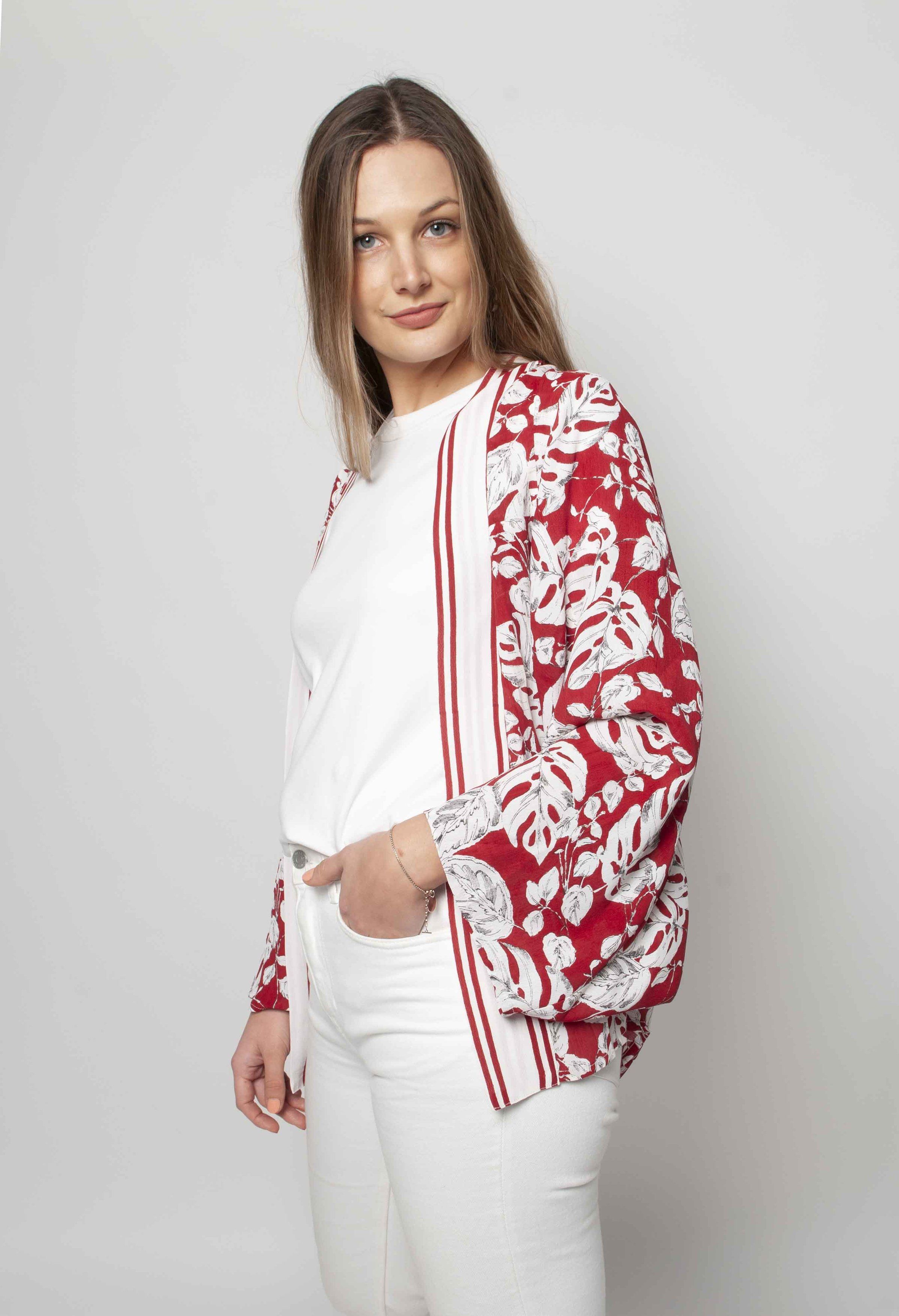 This gorgeous kimono has been inspired by travels to japan, it's striking monstera print is the perfect way to liven up your summer wardrobe. It has a lovely stripe detail on the collar and a full kimono sleeve