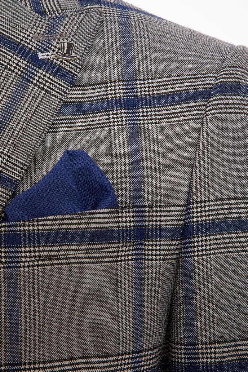 - Pocket Square  - Double Vented Back  - Breast and Functional Pockets  - Peak Lapel  - Double Button Opening  - Lined with Internal Pockets  - Regular Fit  - Length 75cm