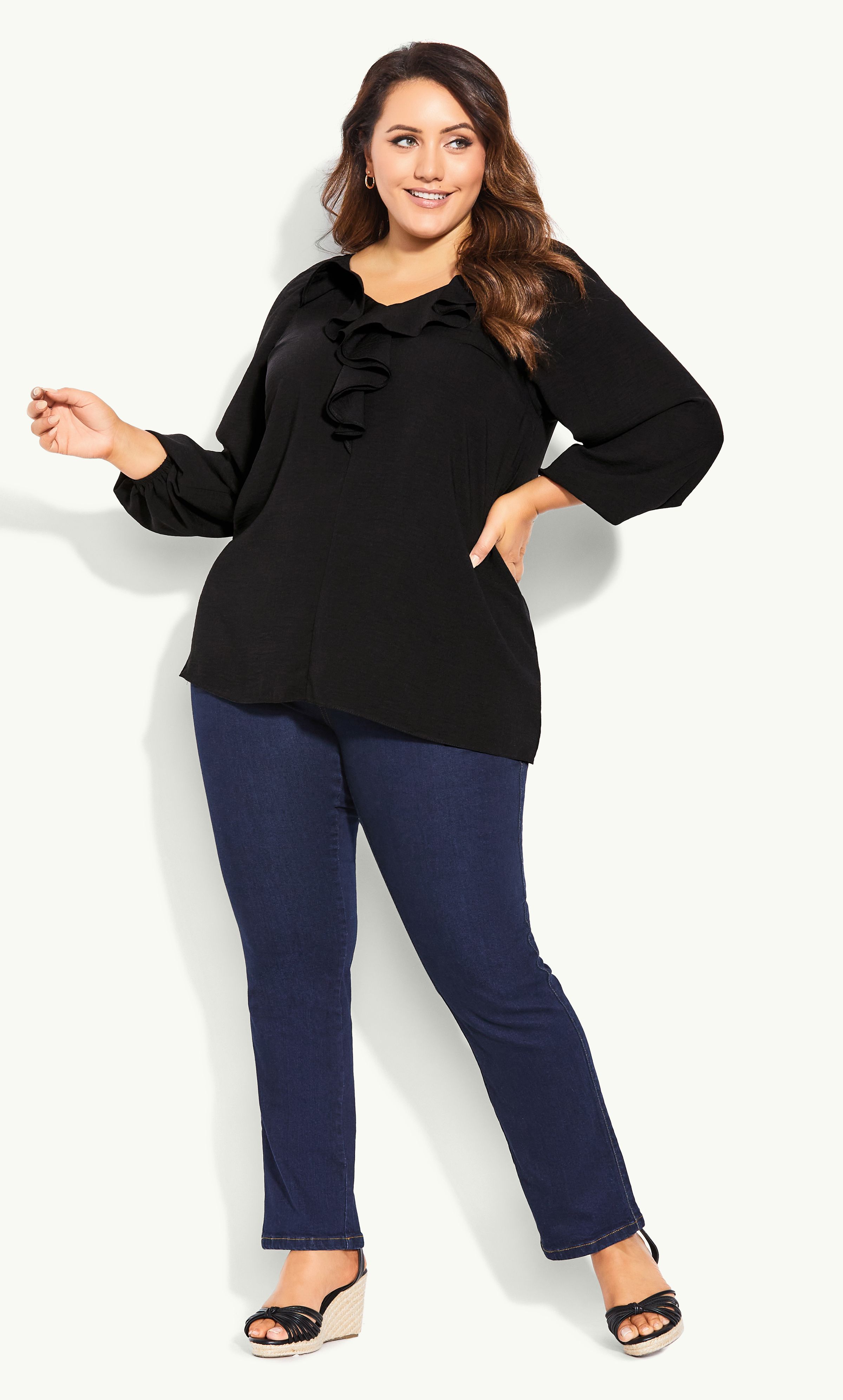 Cute, breezy and undeniably on-trend, the Ruffle Front Blouse will add a touch of chic to your look. Whether you're headed out for brunch with the girls or upstyling for the office, this long sleeved top is the perfect choice every time. Key Features Include: - Ruffled neckline - Long puff sleeves with elasticated cuffs - Relaxed fit - Unlined - Pull over style - Hip length Tuck into a pair of boyfriend jeans and finish with sleek pumps for a glamorous brunch outfit.