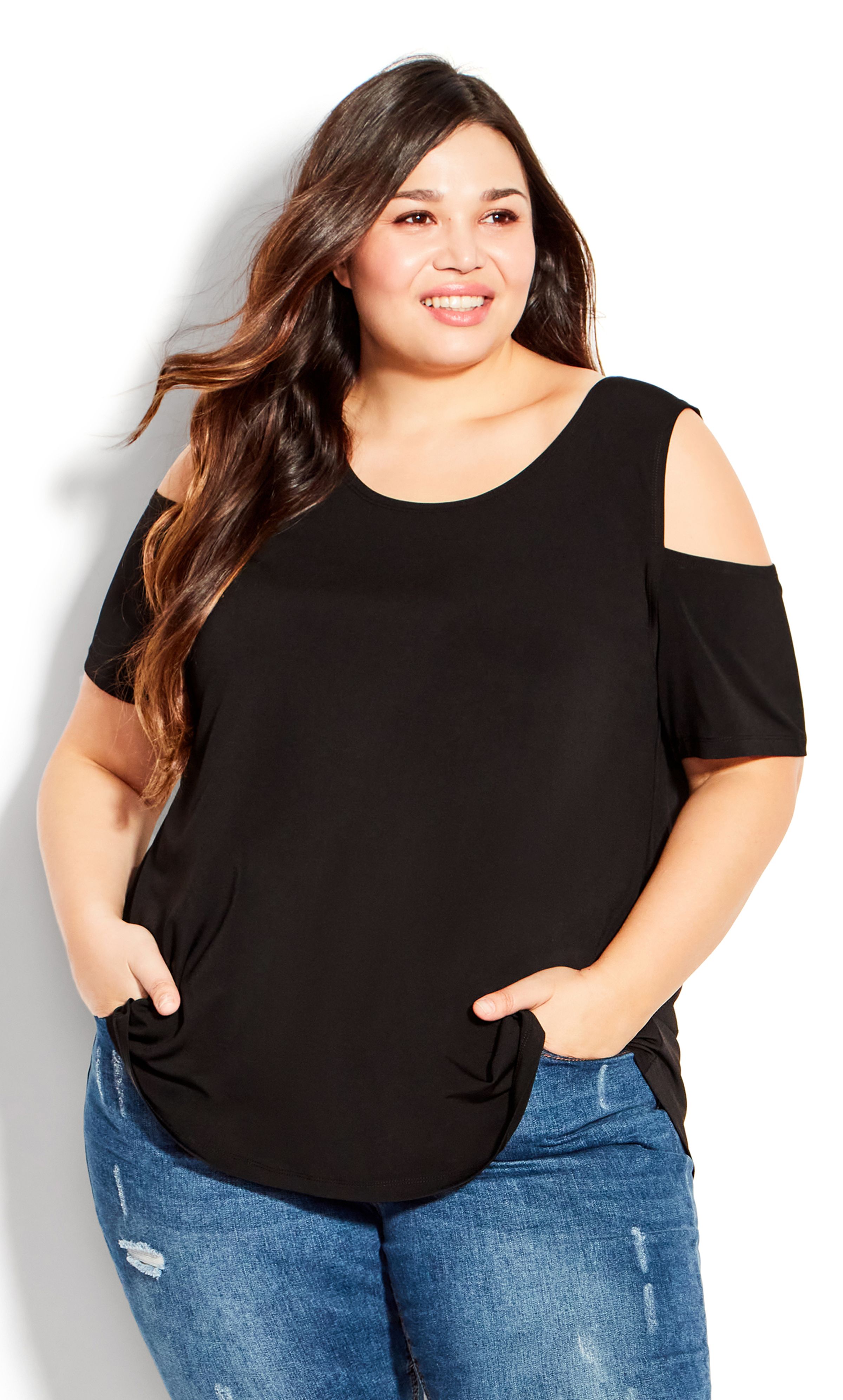 No matter where you're going, you'll be dressed to perfection in the Cold Shoulder Plain Top. This relaxed style adds a playful touch with a glimpse of shoulder and a soft stretch fabrication. A versatile black design, this top is ideal to dress up or down. Key Features Include: - Scoop neckline - Short cold shoulder sleeves - Pullover style - Darted bust for shape - Relaxed fit - Stretch fabrication - Hip length hi-lo hemline Dress up this classic top with a black skirt and a longline statement necklace.