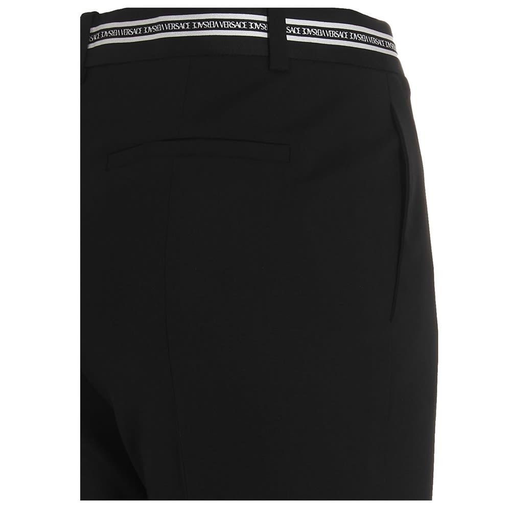 Wool trousers with logo waistband.
