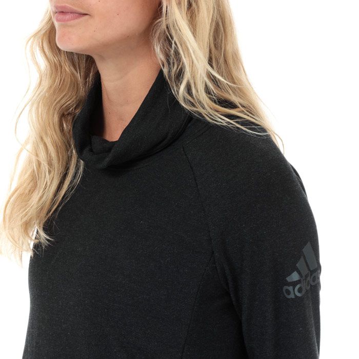 Womens adidas Womens Cozy Cover Up Top in black.<BR><BR>- climalite fabric sweeps sweat away from your skin.<BR>- Turtleneck.<BR>- Full zip fastening.<BR>- Long raglan sleeves.<BR>- Side seam pockets.<BR>- Droptail hem with side splits.<BR>- Soft and stretchy fabric construction.<BR>- adidas Badge of Sport logo printed at left sleeve.<BR>- Regular fit.<BR>- Measurement from centre back neck to front hem: 22in approximately.  Measurement from centre back neck to back hem: 26“ approximately.<BR>- Main material: 60% Viscose  33% Recycled polyester  7% Elastane.  Machine washable.<BR>- Ref: EA3376<BR><BR>Measurements are intended for guidance only.