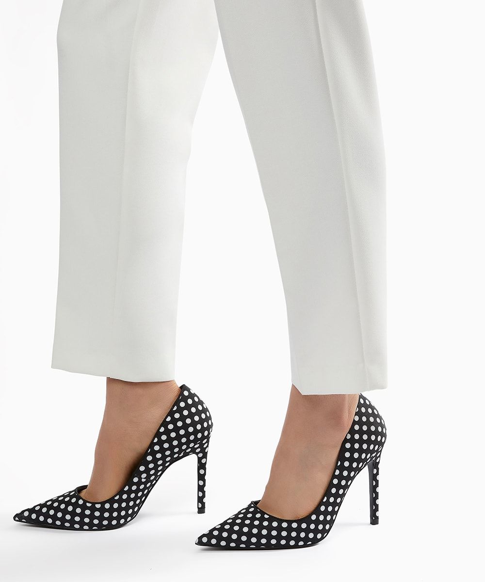 Adding a touch of elegance to your summer ensembles, our Avianna courts feature a slim silhouette, a high heel and a classic monochrome polka-dot.