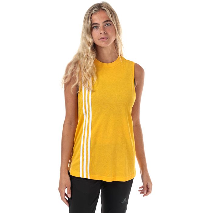 Womens adidas Must Haves 3-Stripes Tank Top in active gold - white.<BR><BR>- Ribbed crew neck. <BR>- Sleeveless.<BR>- Curved hem.<BR>- Applied 3-Stripes over right shoulder from front to back.<BR>- adidas Badge of Sport logo printed at back neck.<BR>- Branded back neck tape.<BR>- Loose fit.<BR>- Measurement from shoulder to hem: 25“ approximately.  <BR>- Main material: 50% Recycled polyester  25% Cotton  25% Viscose.  Machine washable.<BR>- Ref: EB3817<BR><BR>Measurements are intended for guidance only.