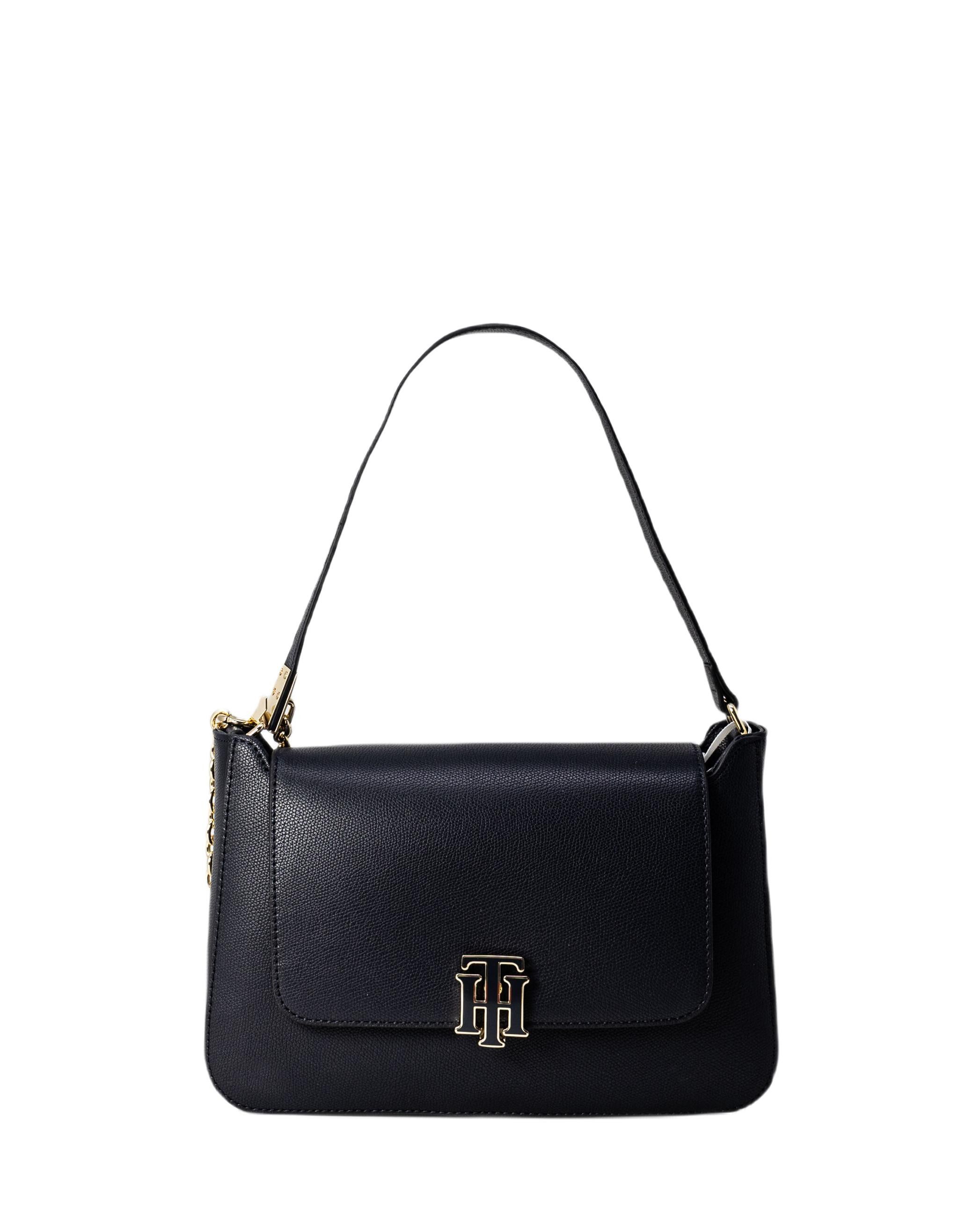 Womens blue Tommy Hilfiger outline shoulder handbag, manufactured with polyurethane. Featuring: th clasp closure, chain handle detail, gold hardware, internal zip section and branded dust bag.