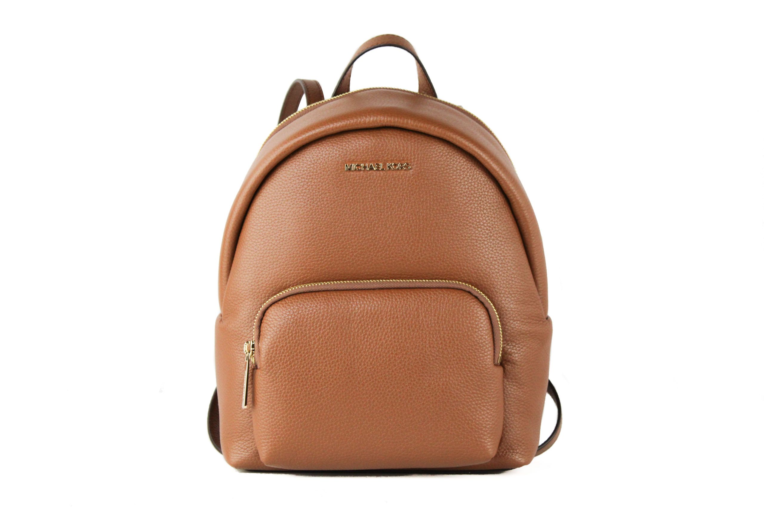 Brand New with Tags attached (100% Authentic). 
Style:. Michael Kors Erin Medium Leather Convertible Backpack (Luggage)
Material: PebbleLeather. 
Features: Inner Pockets, Exterior Zip Pocket, Adjustable/Convertible Straps. 
Measures: 26.67 cmL x 31.75 cm H x 12.7 cm D.